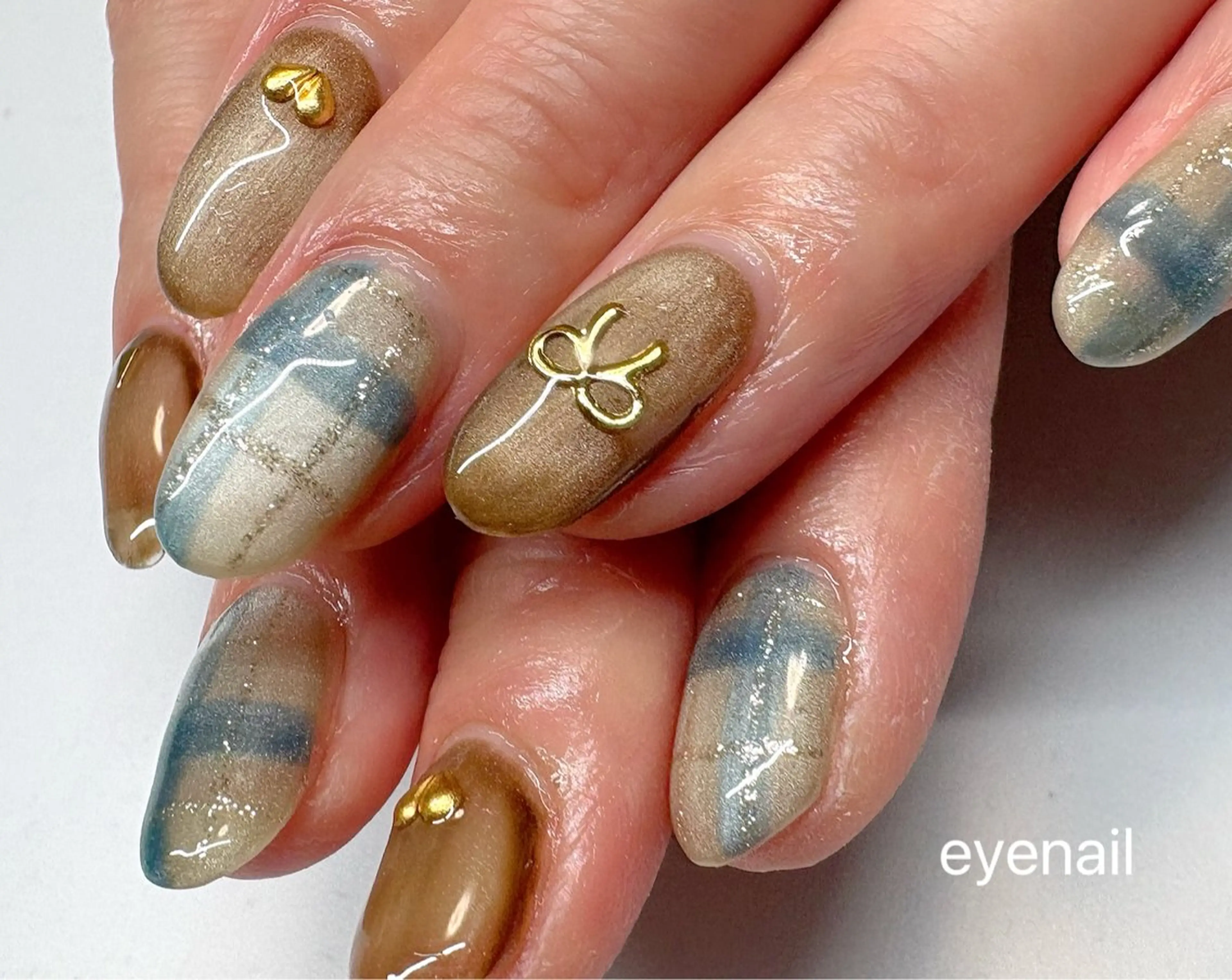 ネイル ハート マグネットネイル リボン ハンドネイル Eye nailのネイルデザイン