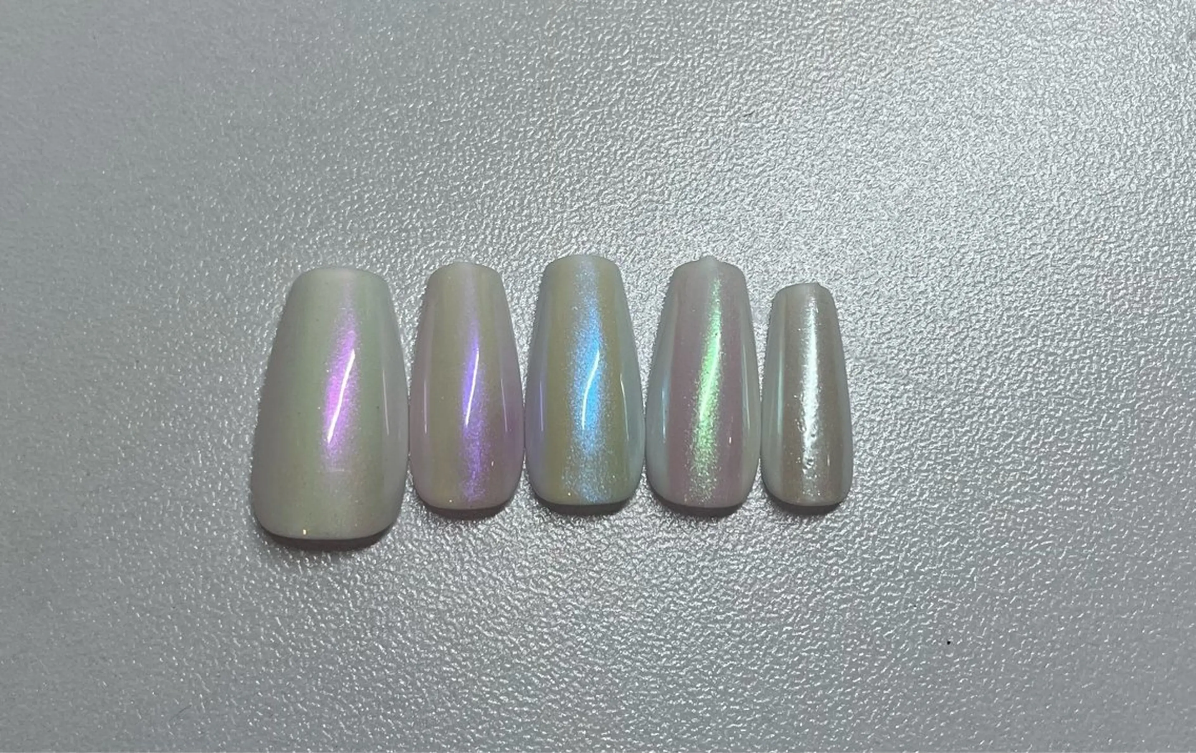 ネイル オーロラネイル ブルー グリーン ピンク パープル nail salon Camelliaのネイルデザイン