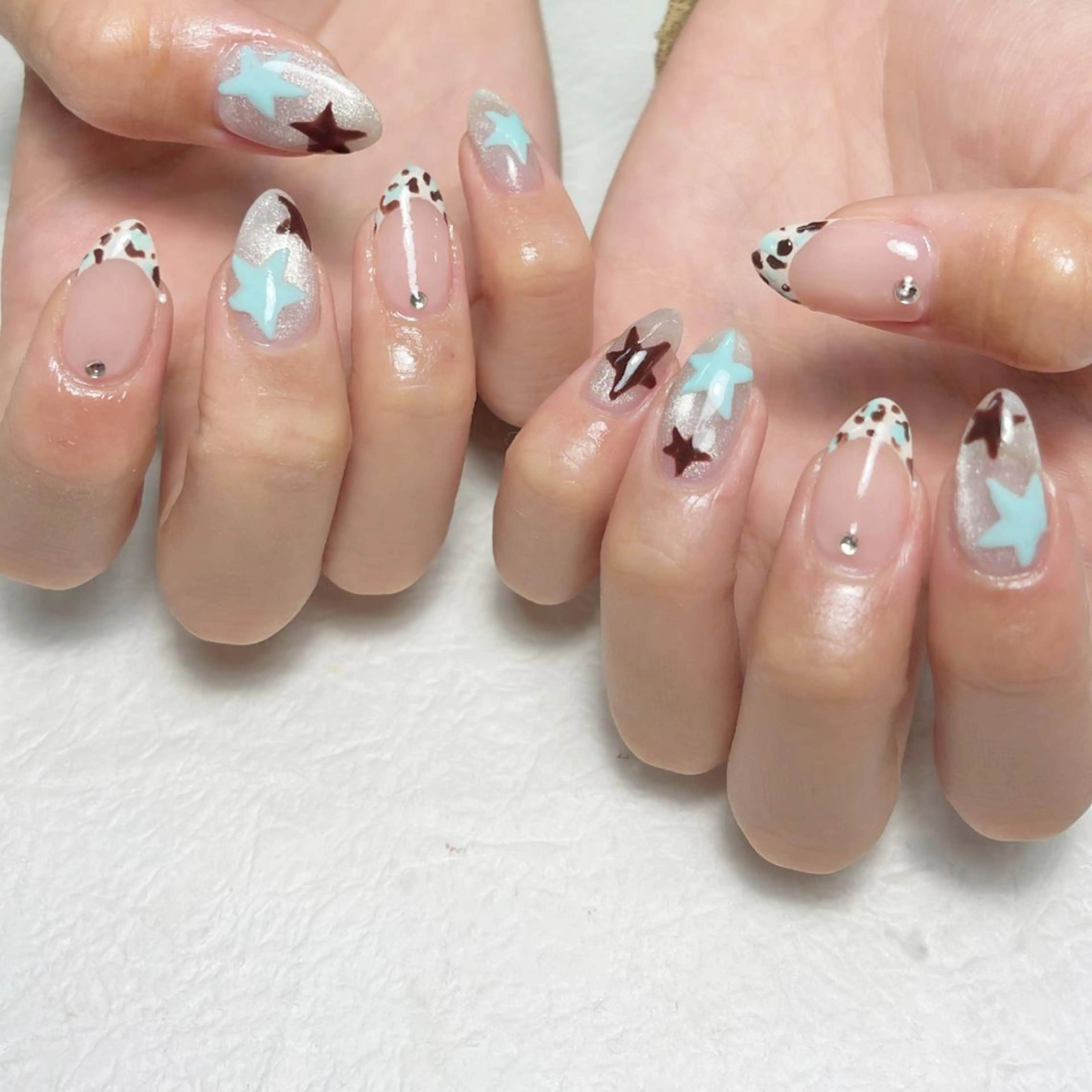 ネイル ブラウン 水色 ハンドネイル 🐈‍⬛ Minamiのネイルデザイン