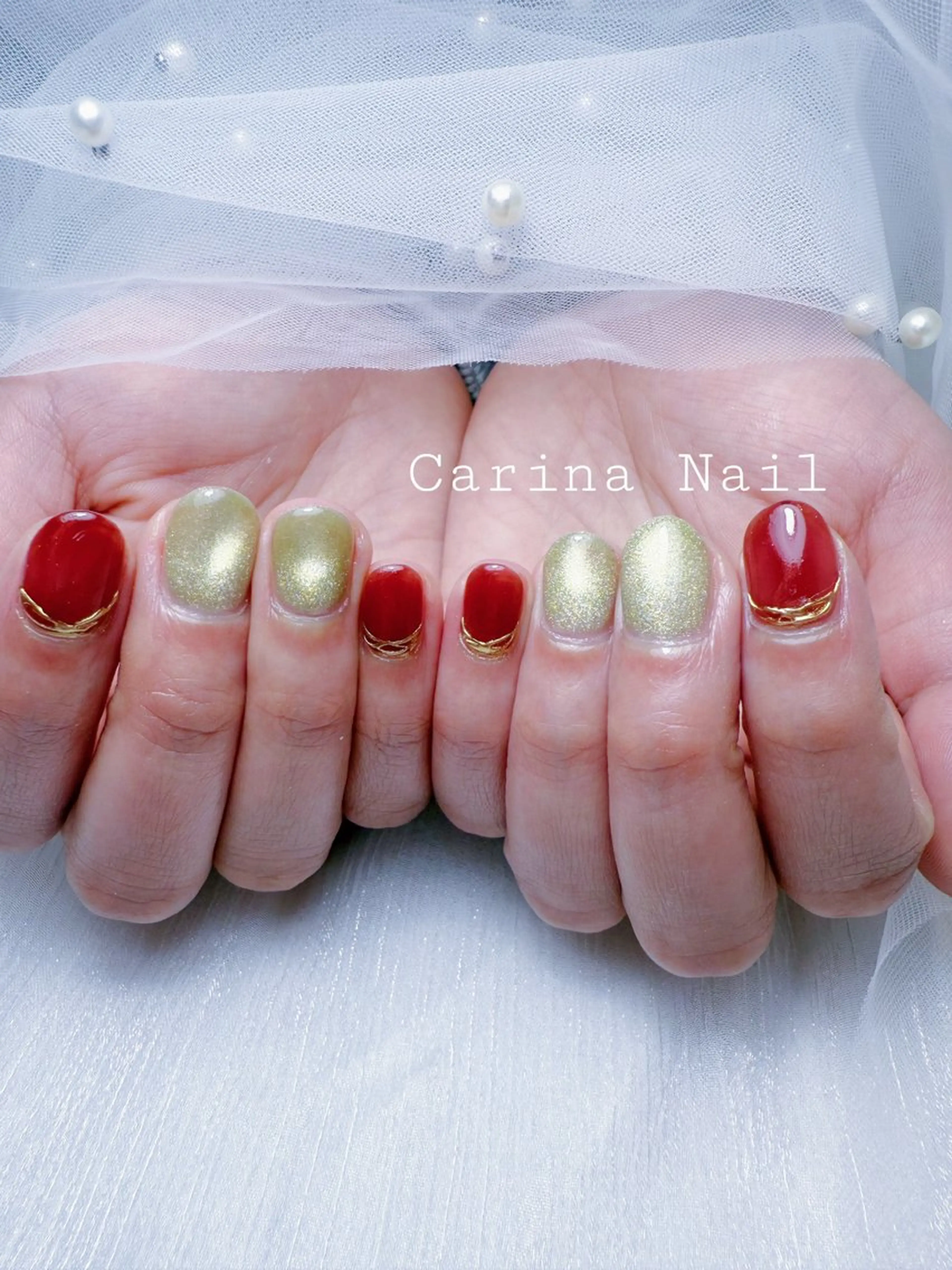 ネイル ゴールド 赤色 Carina Nailのネイルデザイン