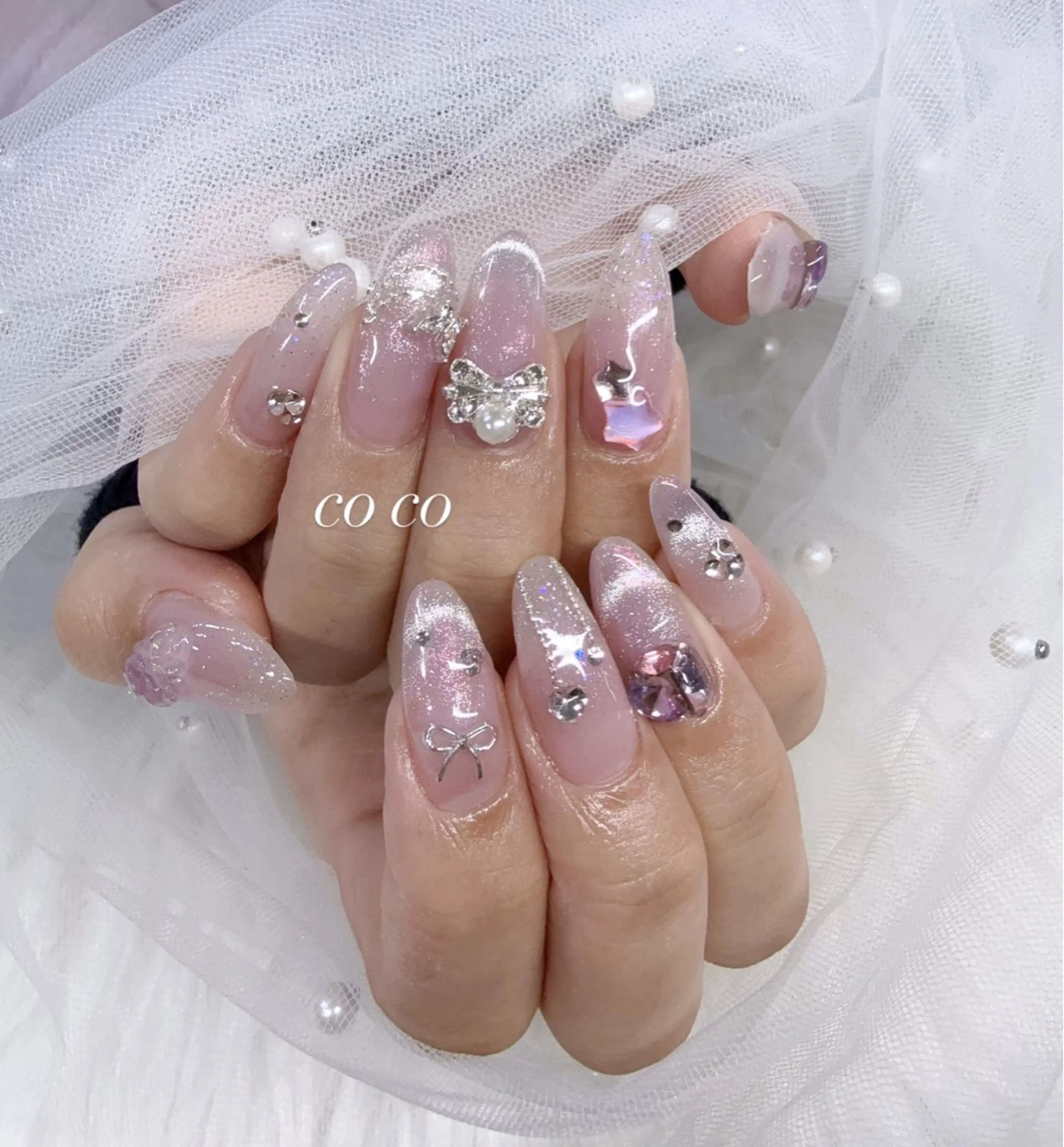 ネイル 成人式 ピンク ピンクベージュ リボン ブライダルネイル COCO ネイルのネイルデザイン