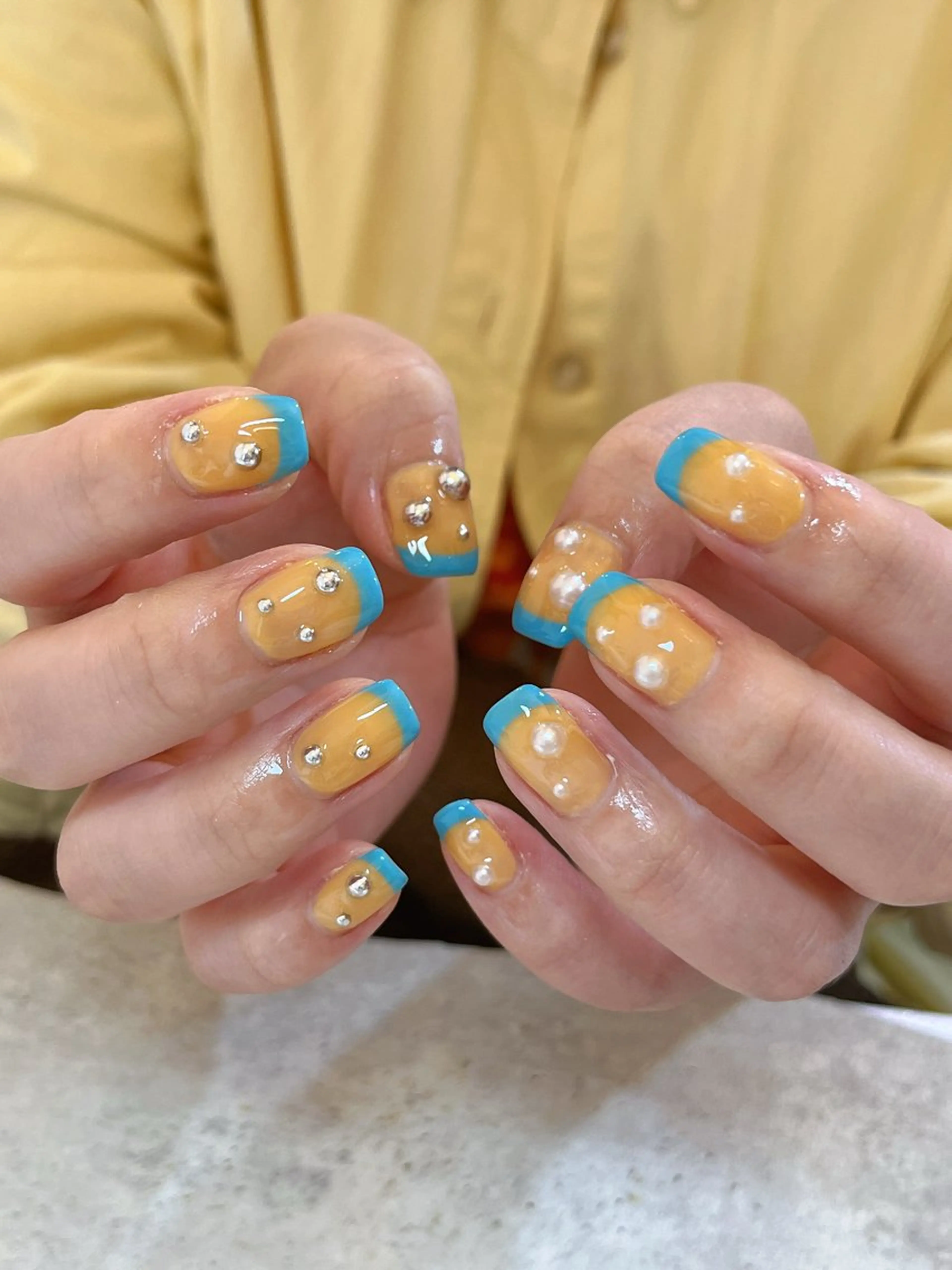 ネイル フレンチネイル オレンジ ハンドネイル r.nailBY α 大阪福島区/岸本🧸のネイルデザイン