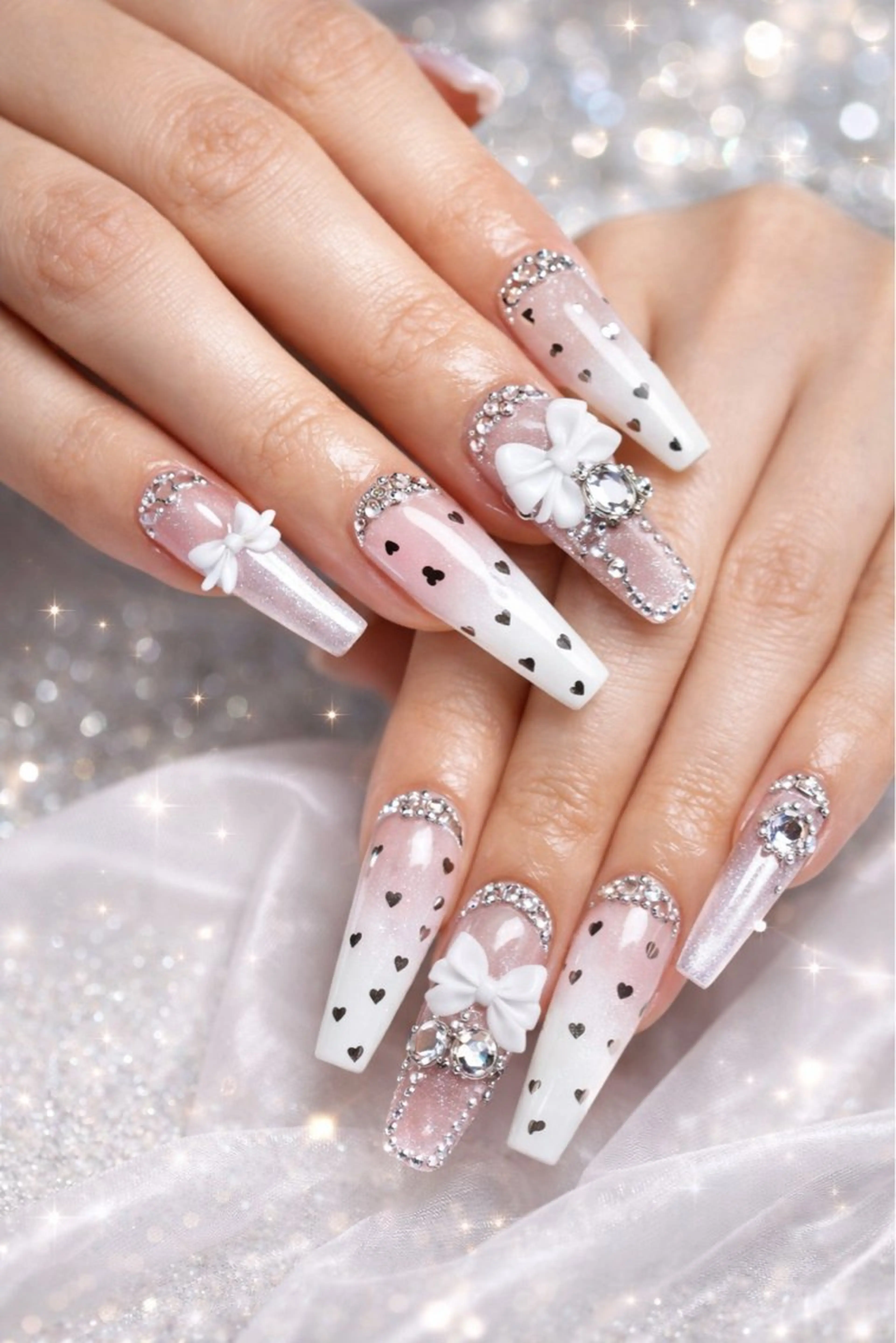 ✨モデル限定✨ キラキラリボンネイル（長さ出し＋パーツ）の写真