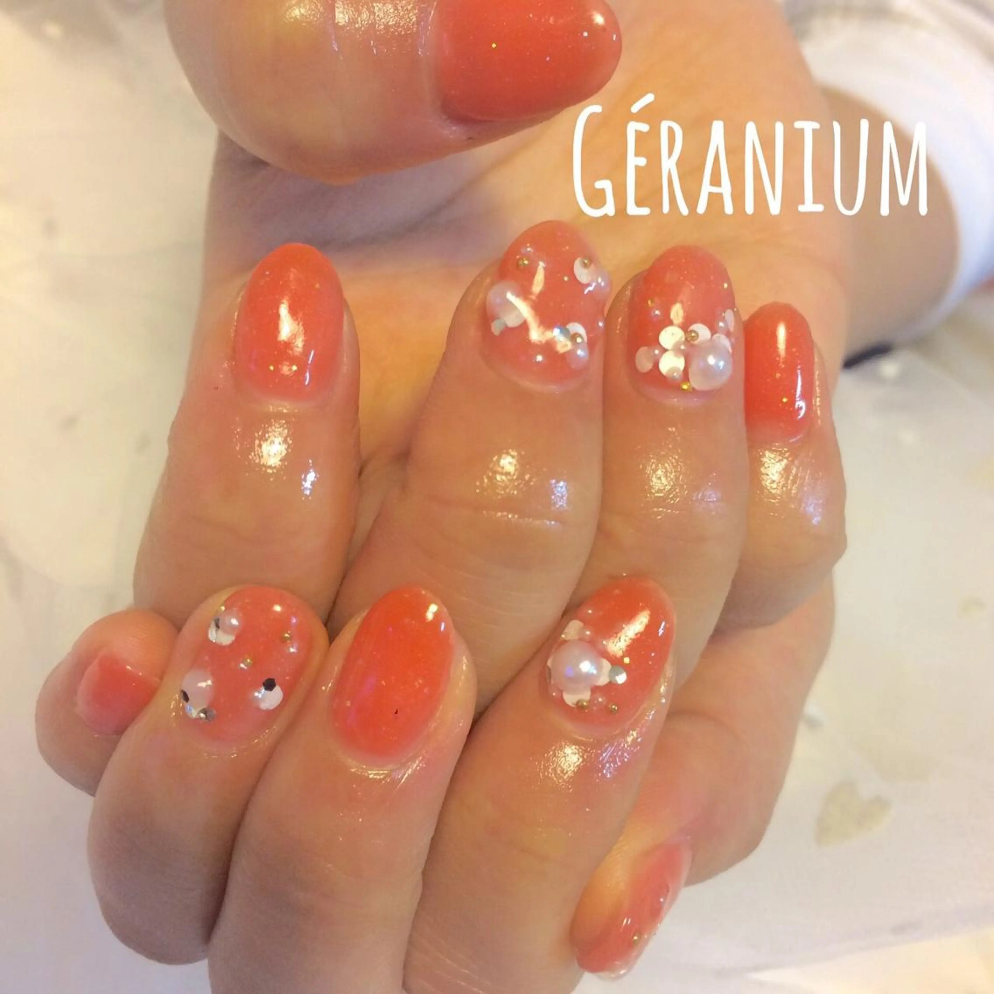 ネイル オレンジ GéRanium Harukaのネイルデザイン