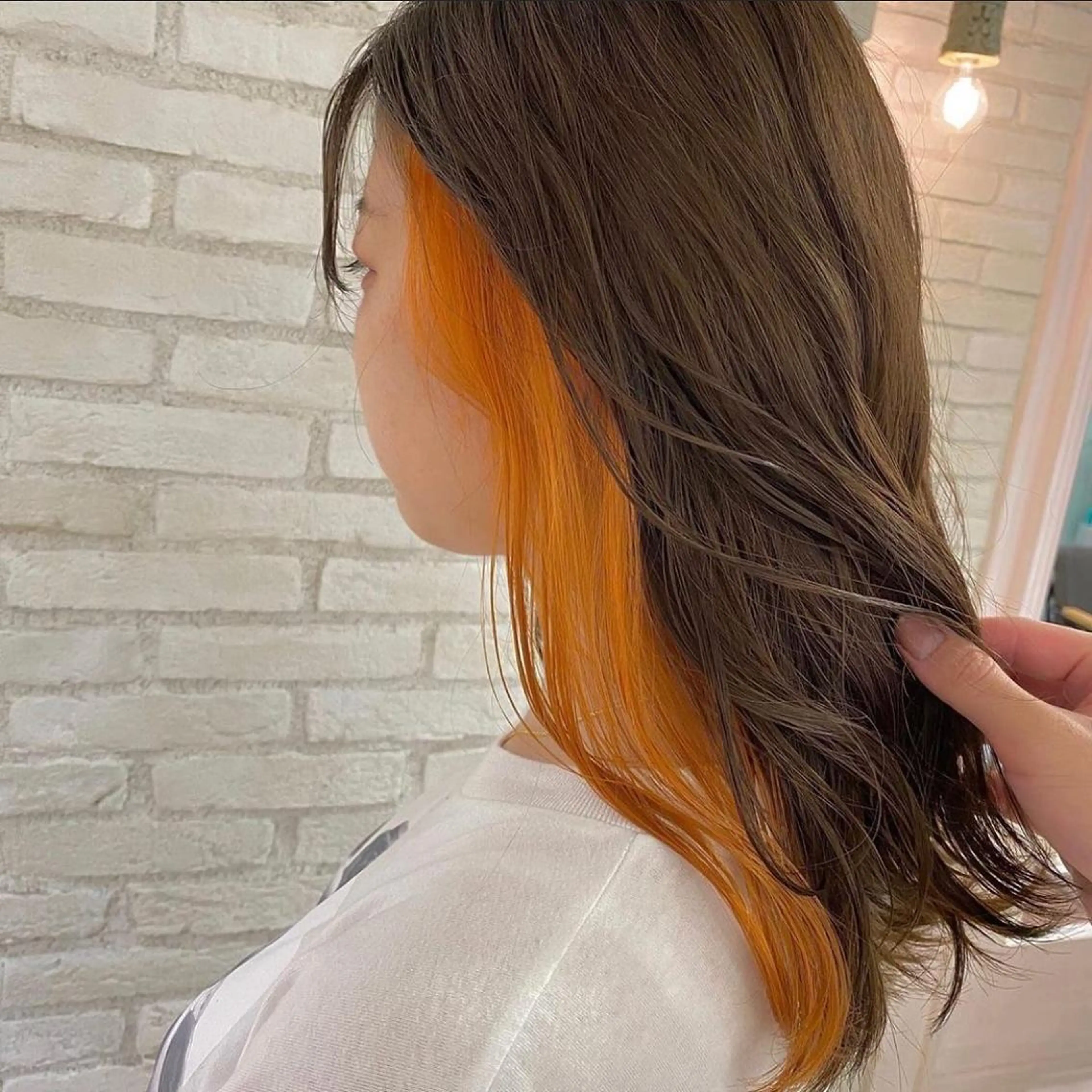 ミディアム カラー イヤリングカラー オレンジ 渋谷/ボブ×髪質改善 輝来のヘアスタイル