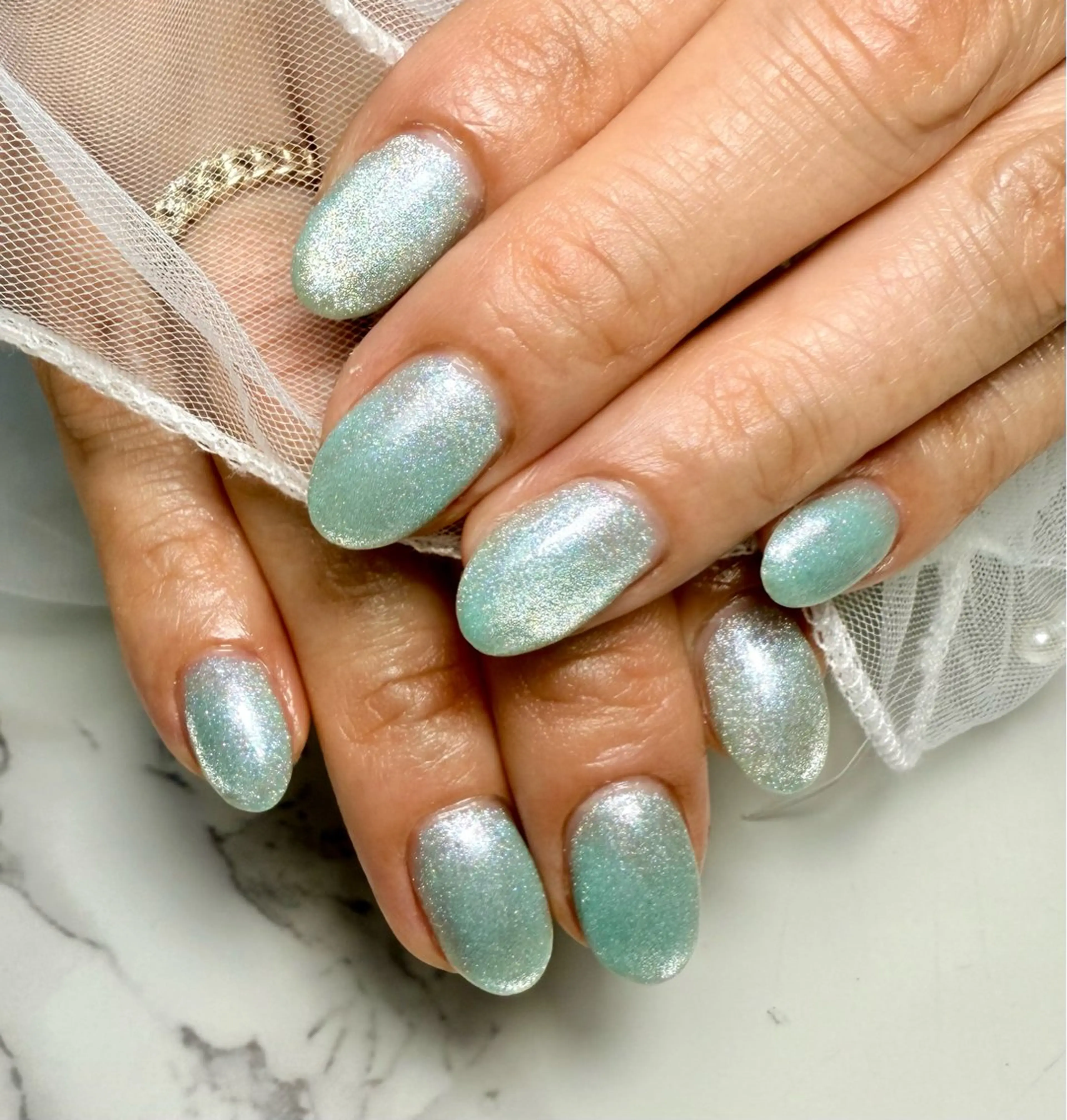 ネイル アートネイル チークネイル 氷ネイル・うるうるネイル キラキラネイル マグネットネイル M.N_ nailのネイルデザイン