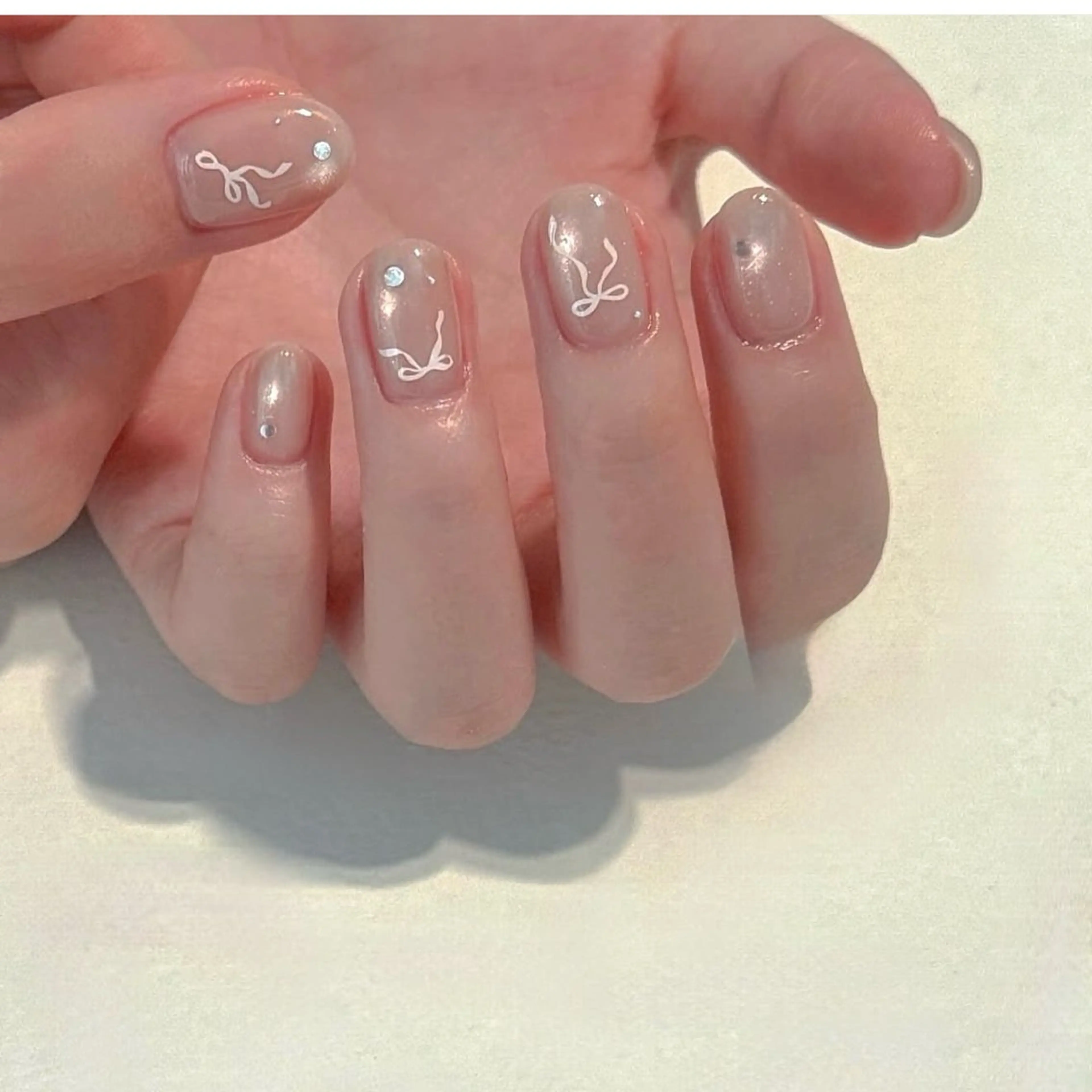 ネイル アートネイル チークネイル 韓国ネイル リボン シンプルネイル ハンドネイル ハンドケア Akina Nailのネイルデザイン