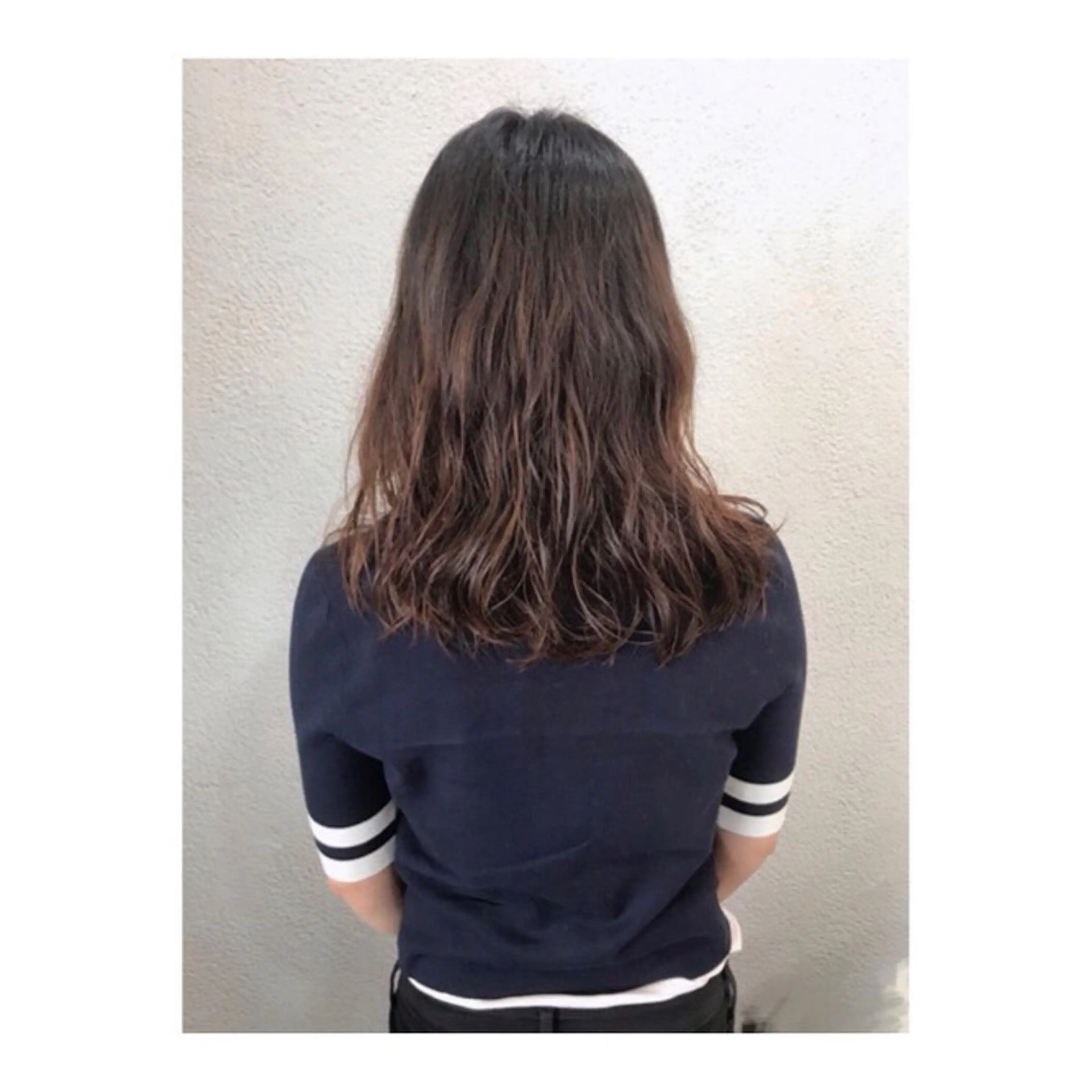 ロング パーマ 小磯 維織のヘアスタイル