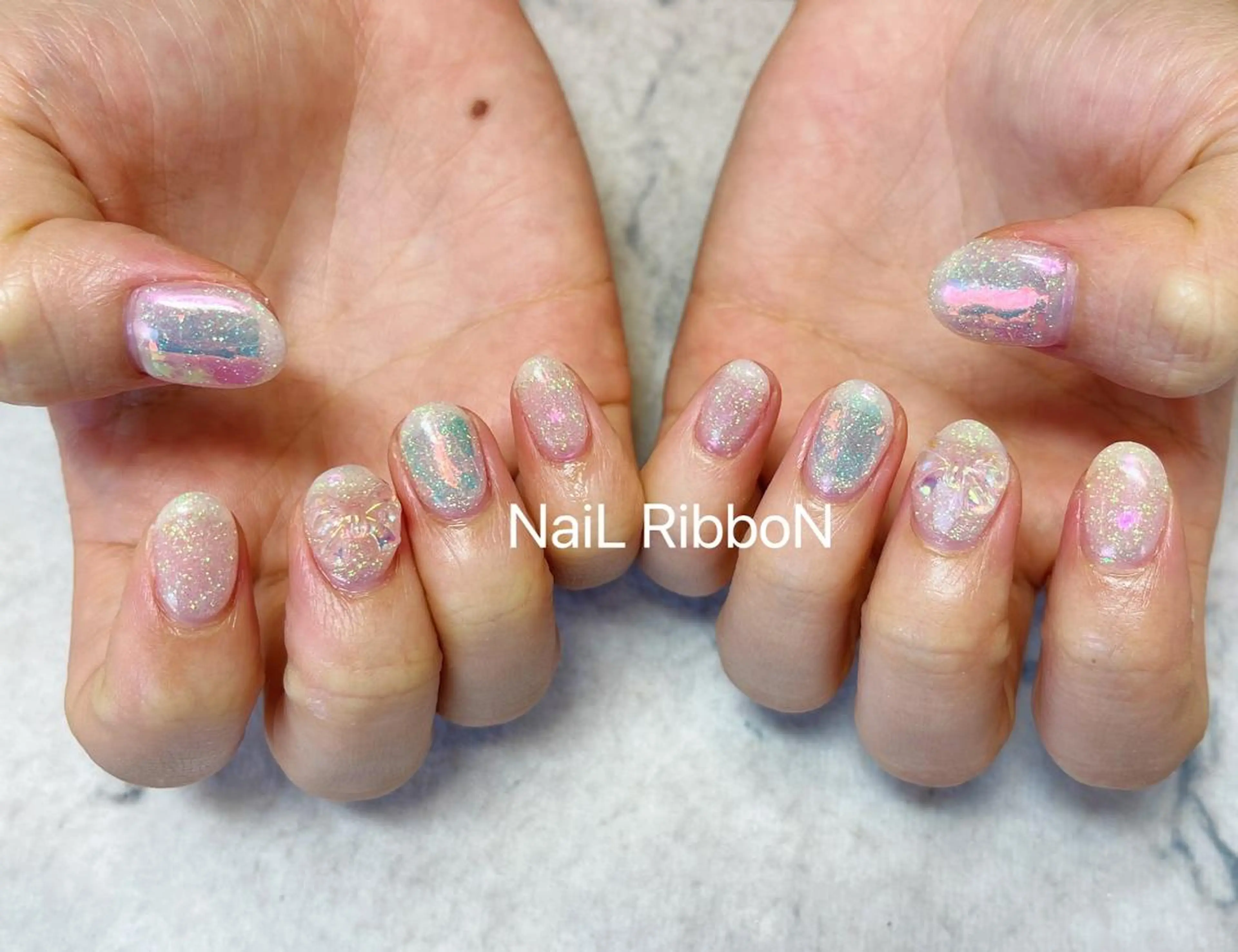 ネイル ネイルリボン 受付スタッフのネイルデザイン