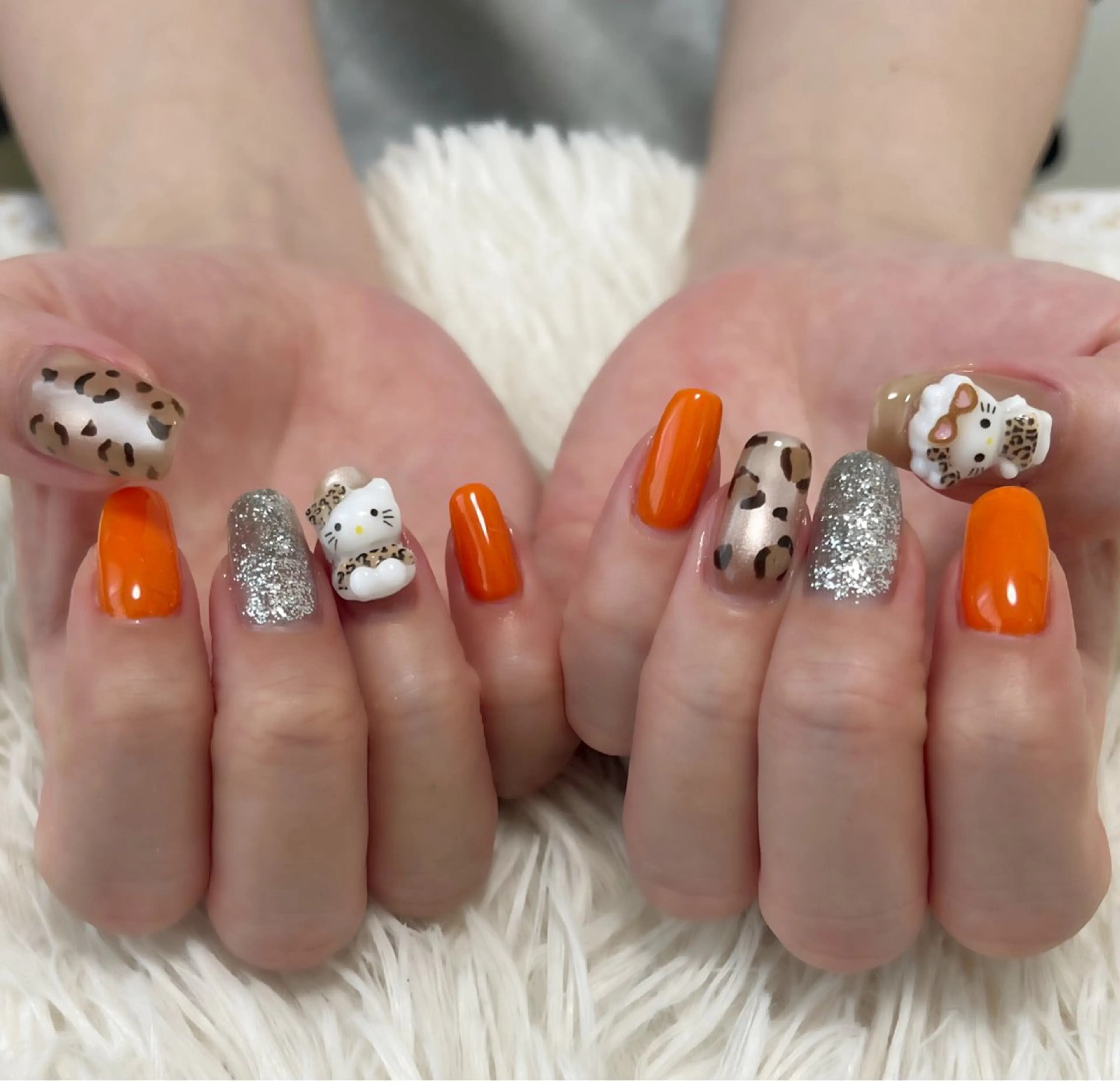 ネイル アニマル柄 オレンジ 夏ネイル ハンドネイル 島田 亜紀のネイルデザイン