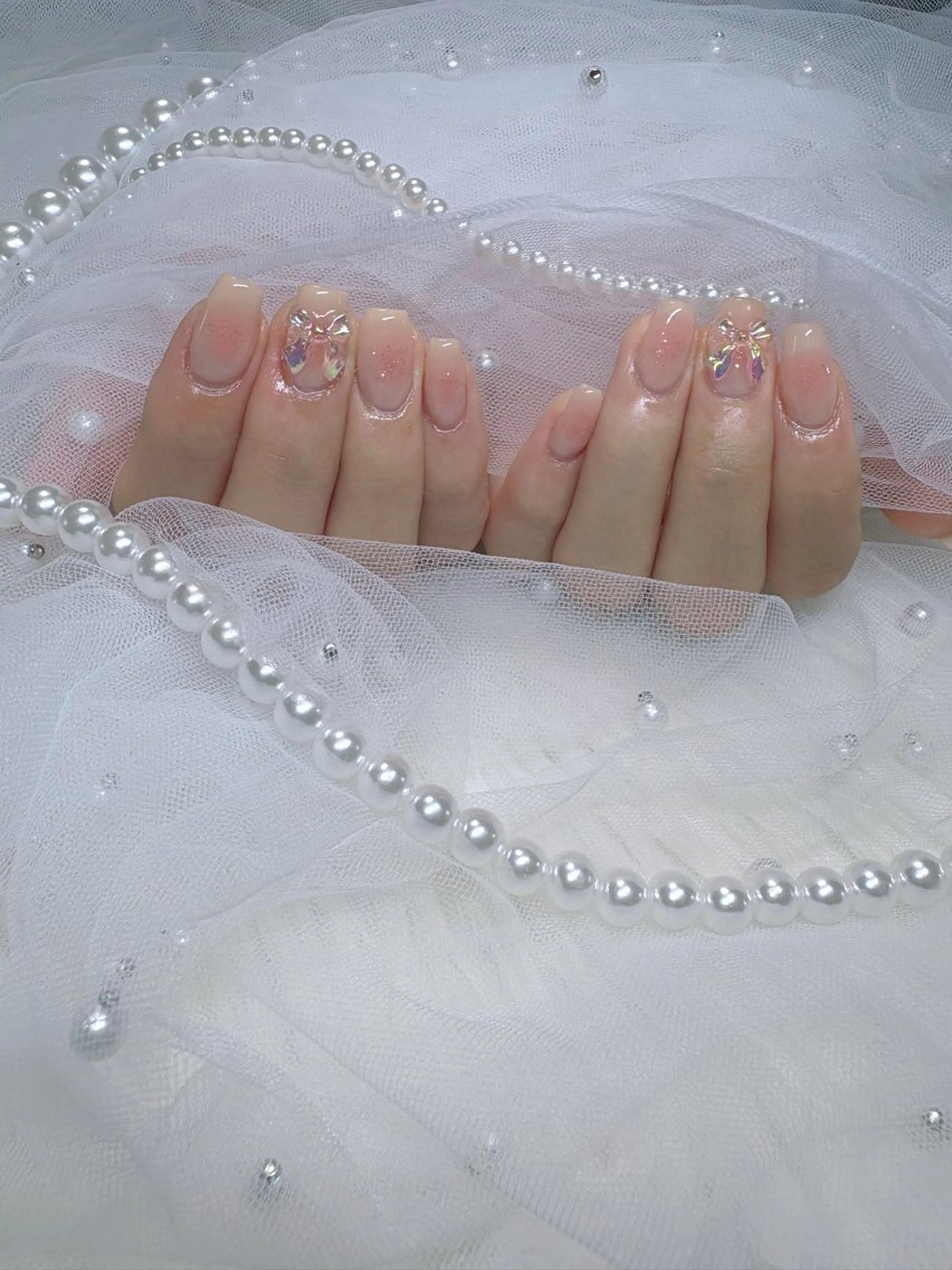 ネイル チークネイル リボン TOMO. Libのネイルデザイン