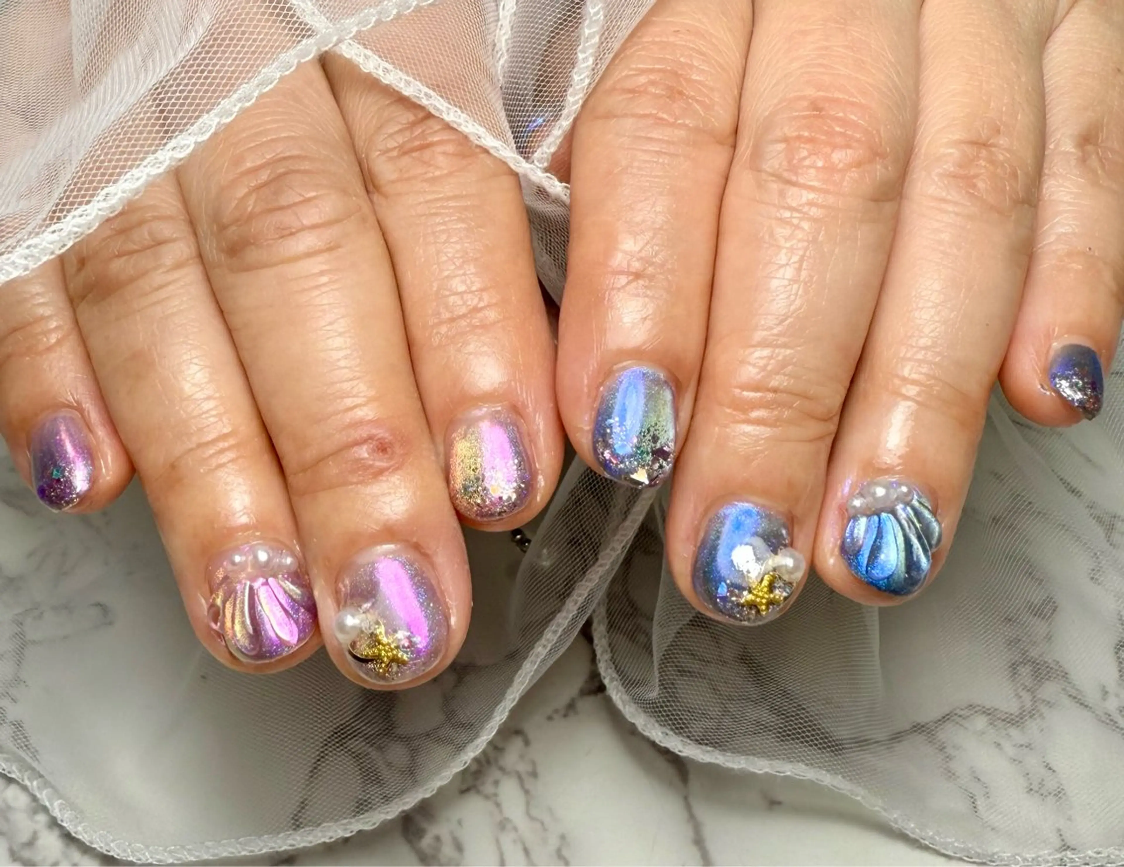 ネイル アートネイル フレンチネイル ガラスフレンチ 氷ネイル・うるうるネイル キラキラネイル M.N_ nailのネイルデザイン
