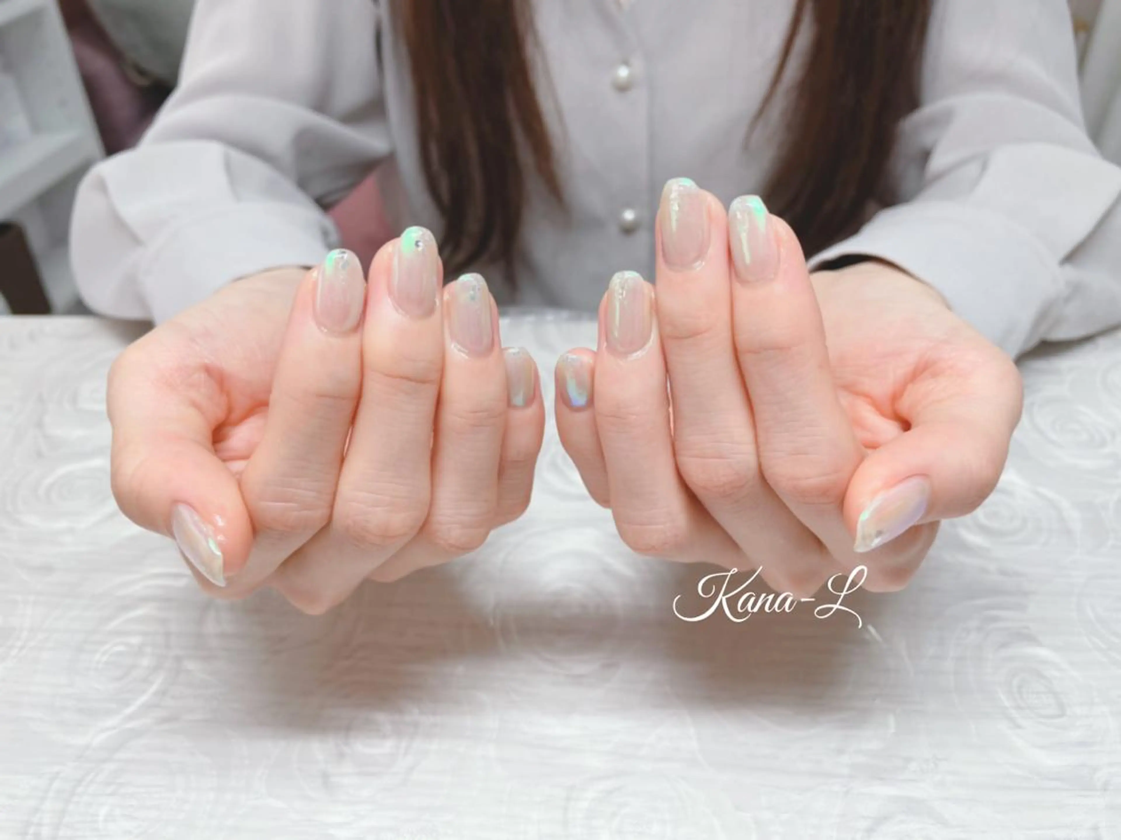 ネイル オーロラネイル 芦辺 香奈のネイルデザイン