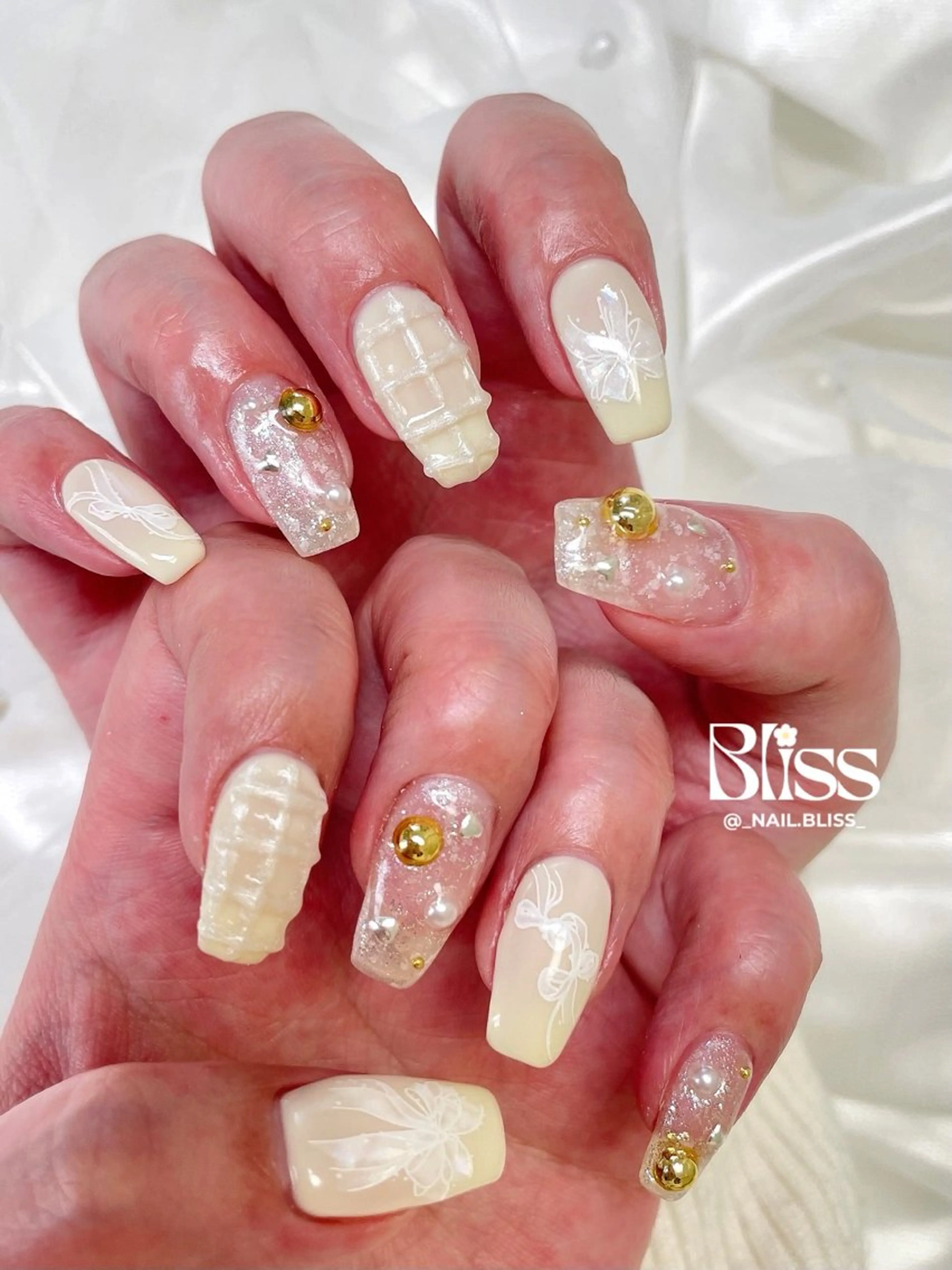 ネイル ガーリー リボン 春ネイル 黄色 ハンドネイル NAIL BLISSのネイルデザイン