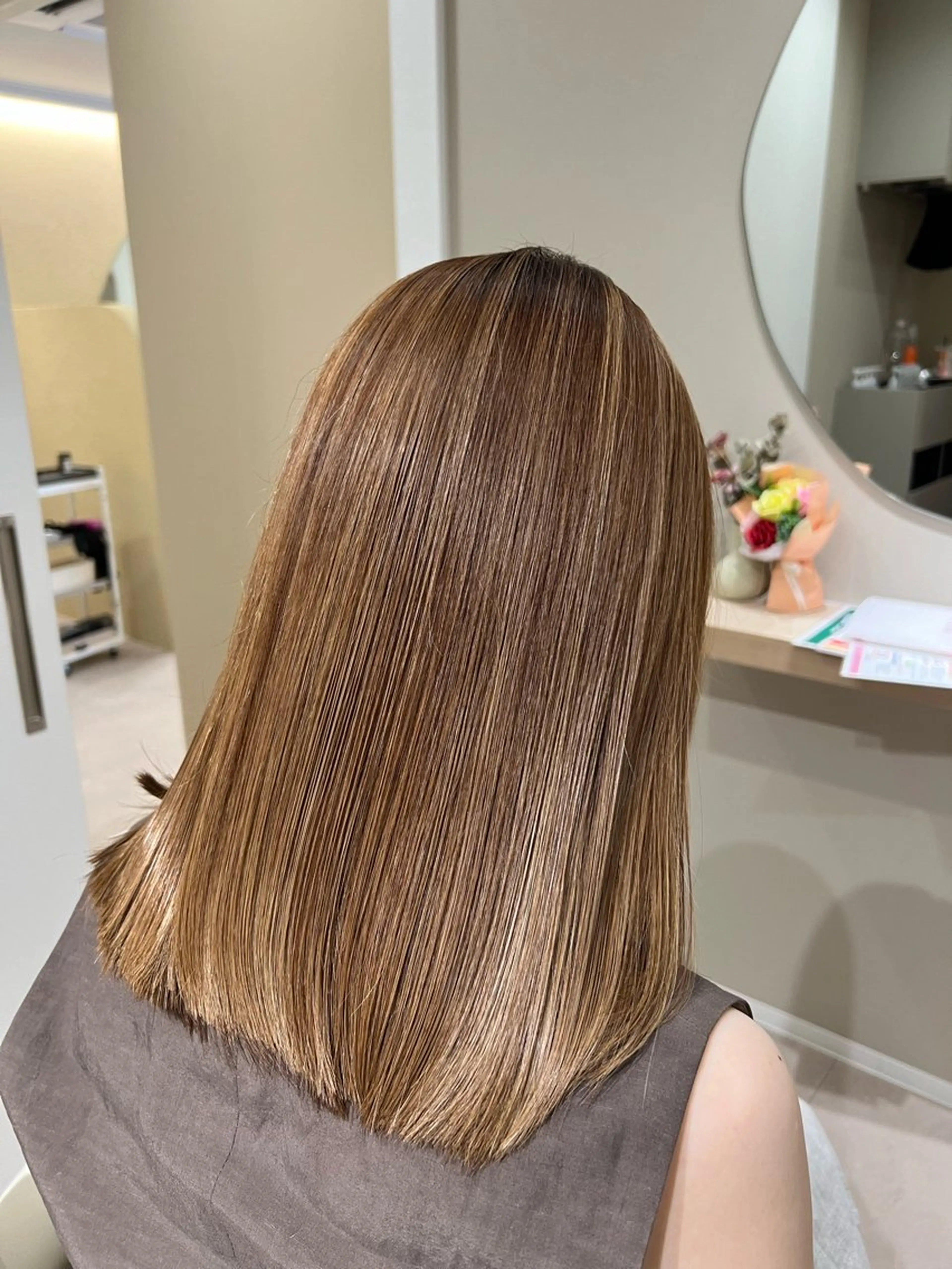 【カット+ハイライト+ツヤ髪カラー+最高級ダメージ補修ケラチントリートメント+巻き髪+ストレート仕上げ】の写真