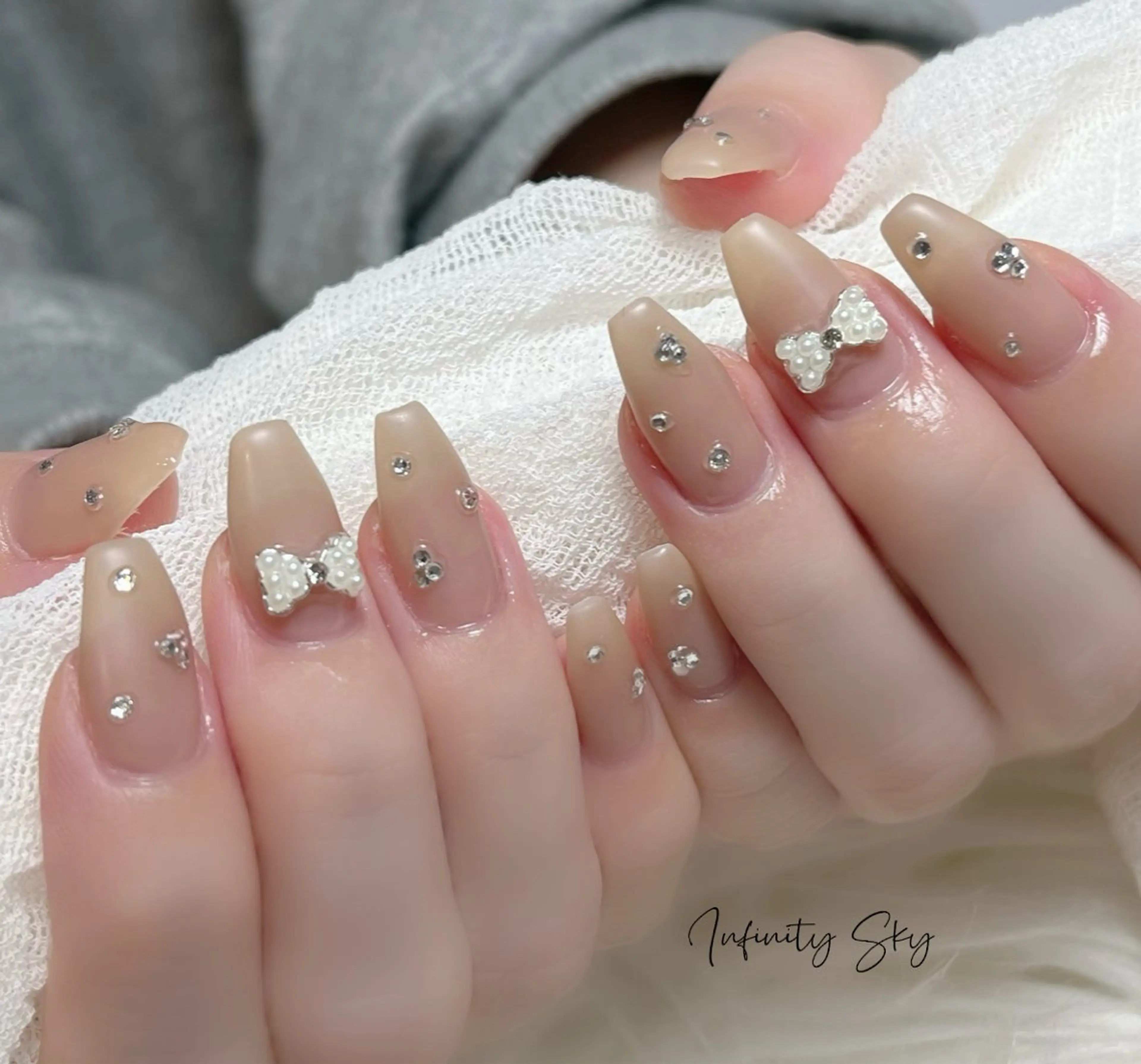 ネイル リボン 冬ネイル infinity skyのネイルデザイン