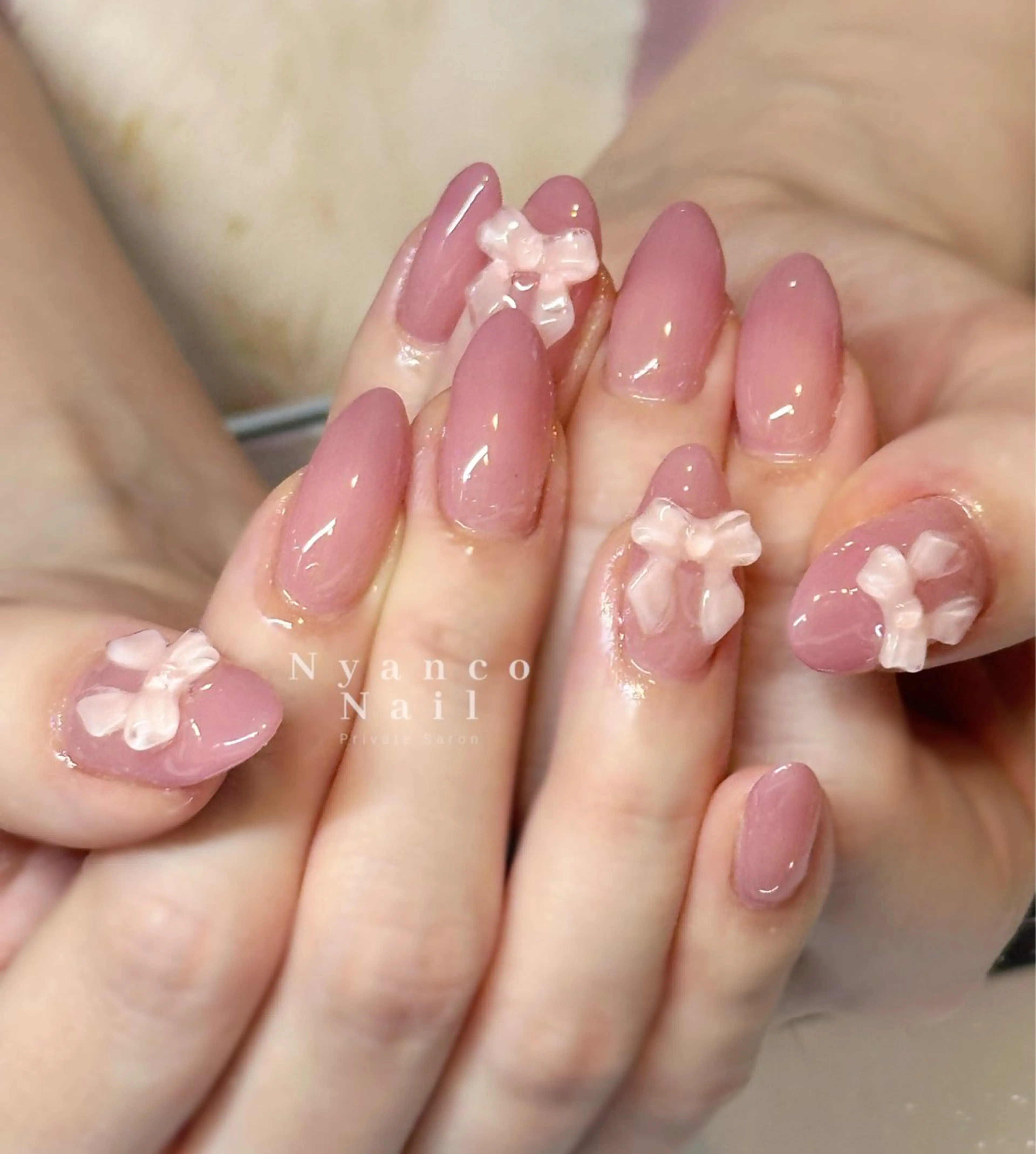 ネイル ジェルネイル ワンカラーネイル ピンク リボン 春ネイル Nyanco Nailのネイルデザイン