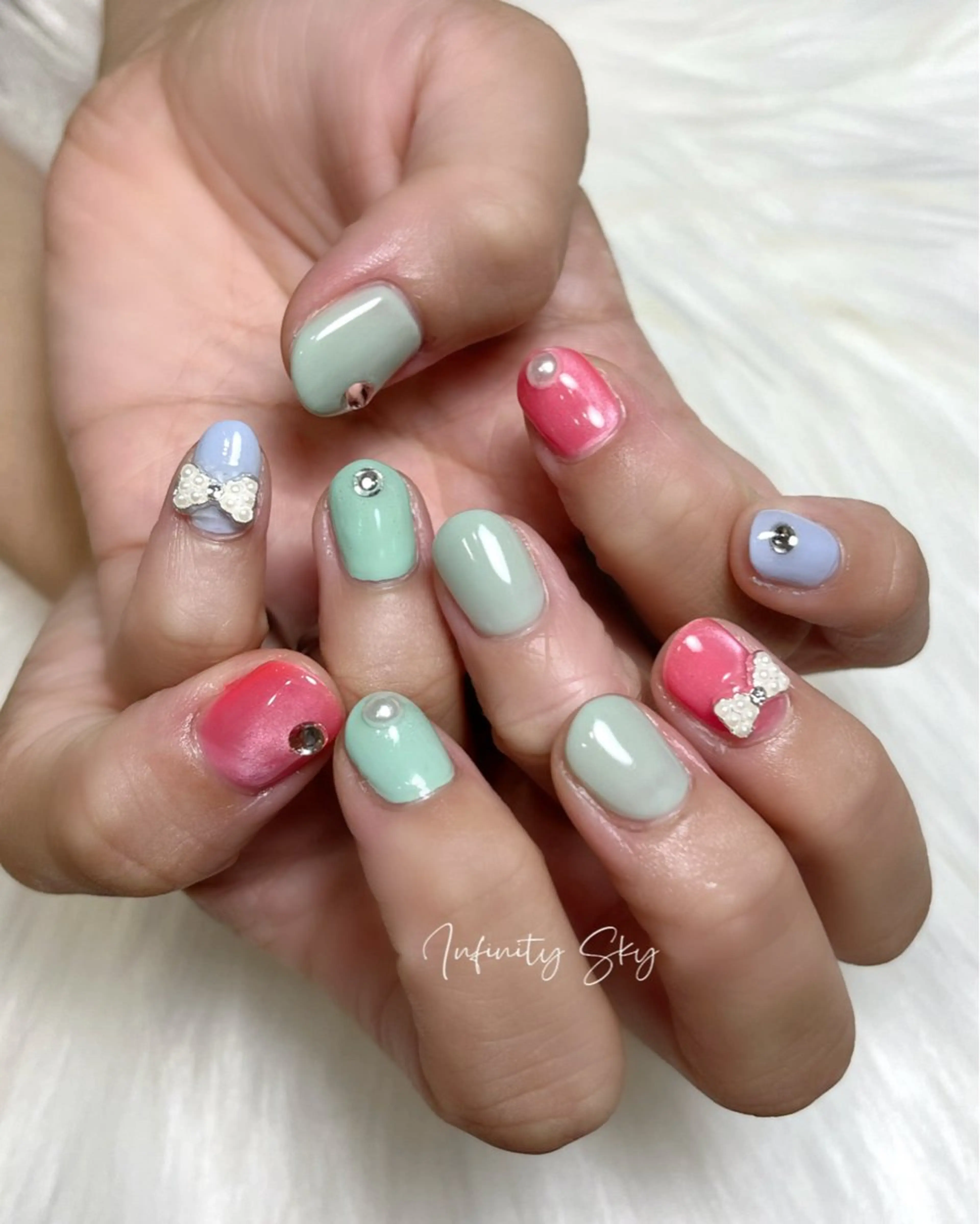 ネイル リボン infinity skyのネイルデザイン