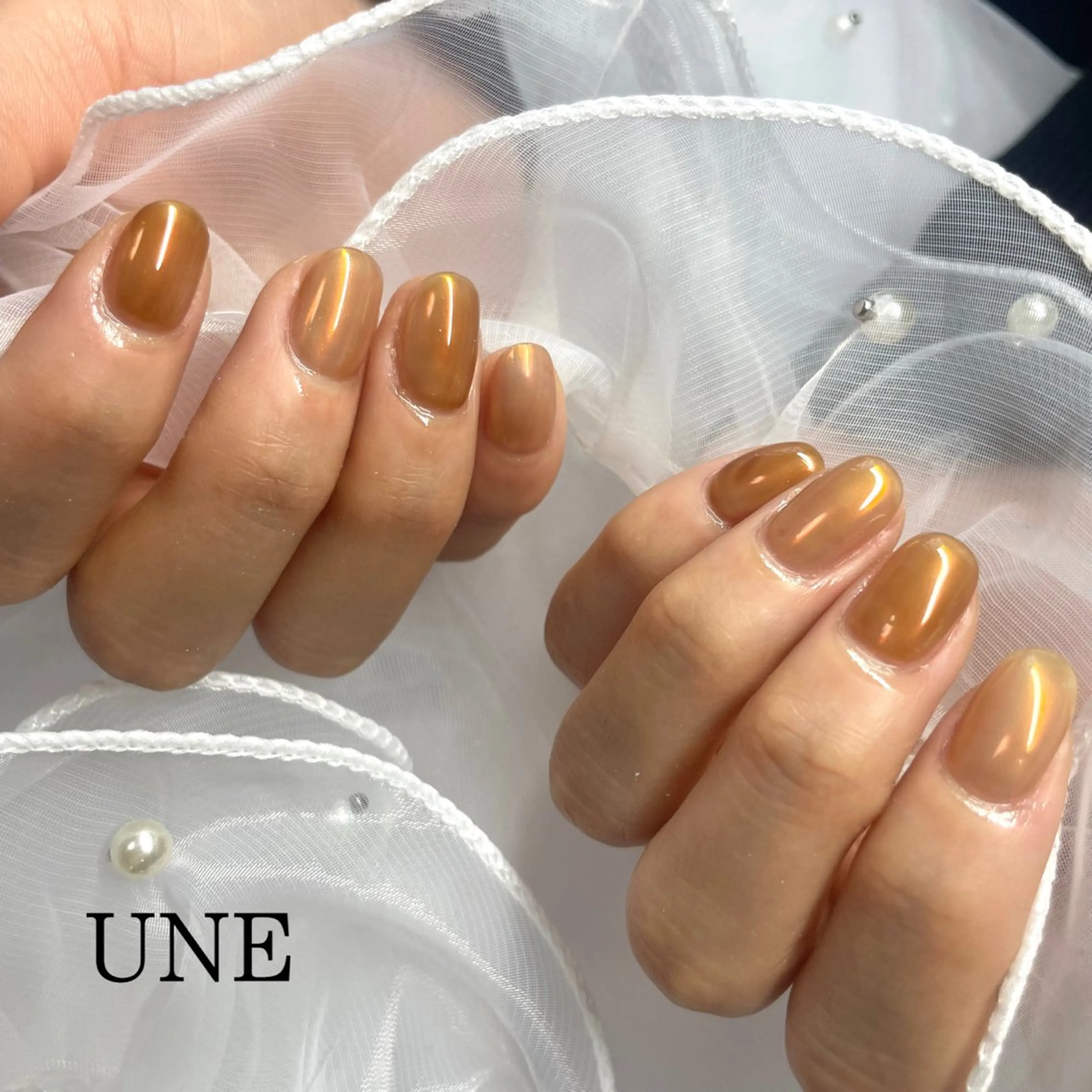 ネイル 氷ネイル・うるうるネイル UNE.【ユヌ】 Jr.NANAのネイルデザイン