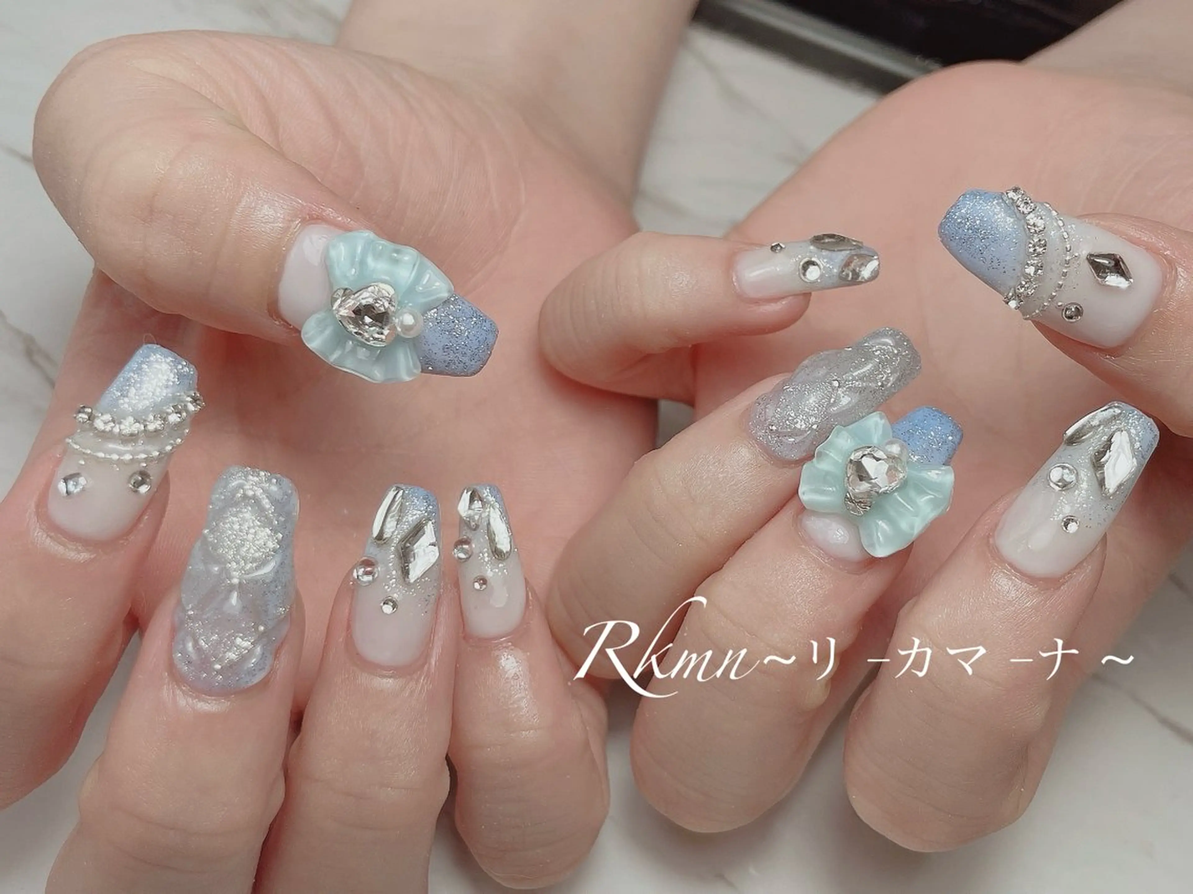 ネイル アートネイル 水色 リボン 春ネイル ワンホンネイル ハンドネイル フットネイル ハンドケア Rkmn ~リ-カマ-ナ~のネイルデザイン