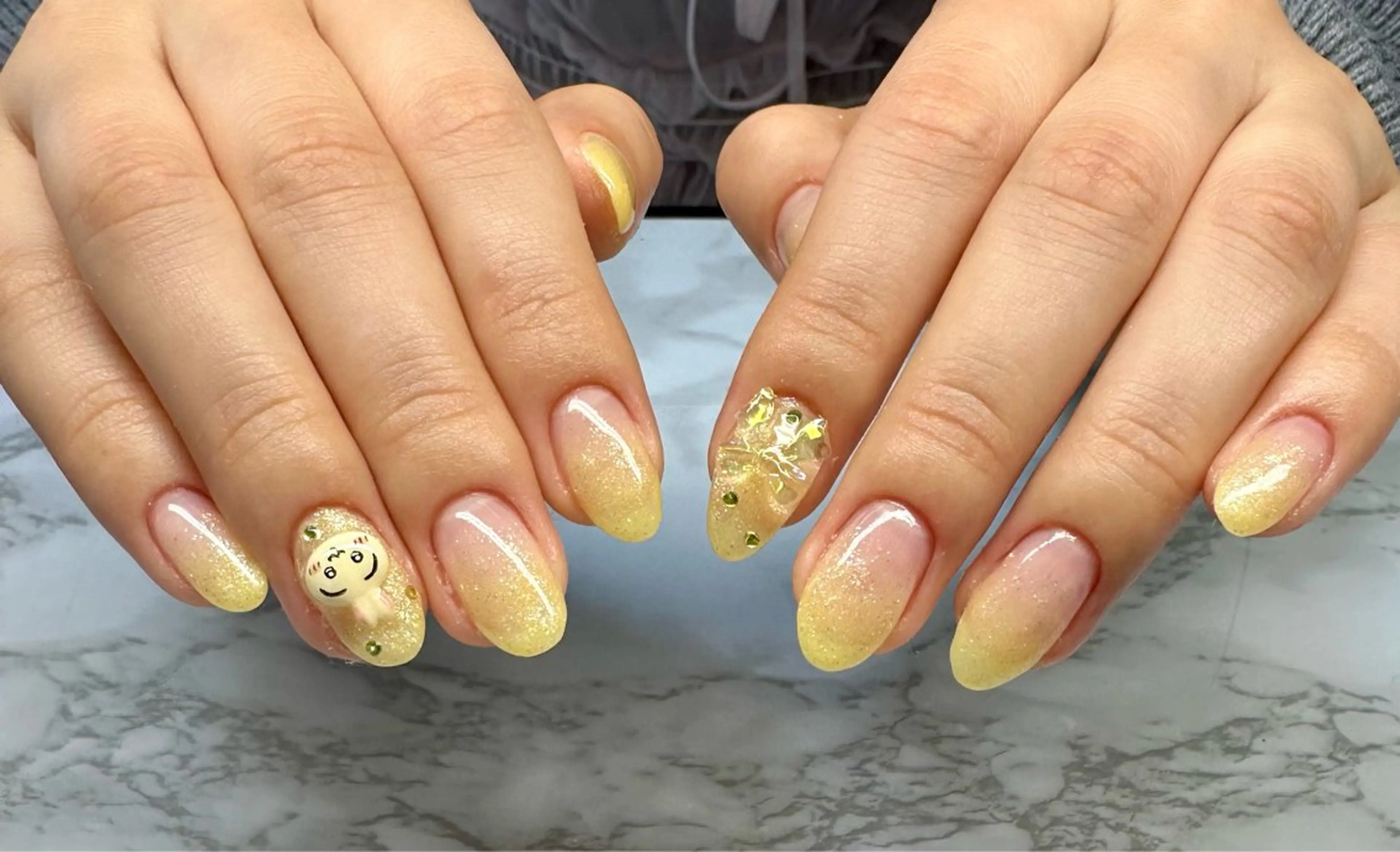 ネイル ラメ(グリッター) ラメグラデーション リボン 春ネイル M.N_ nailのネイルデザイン