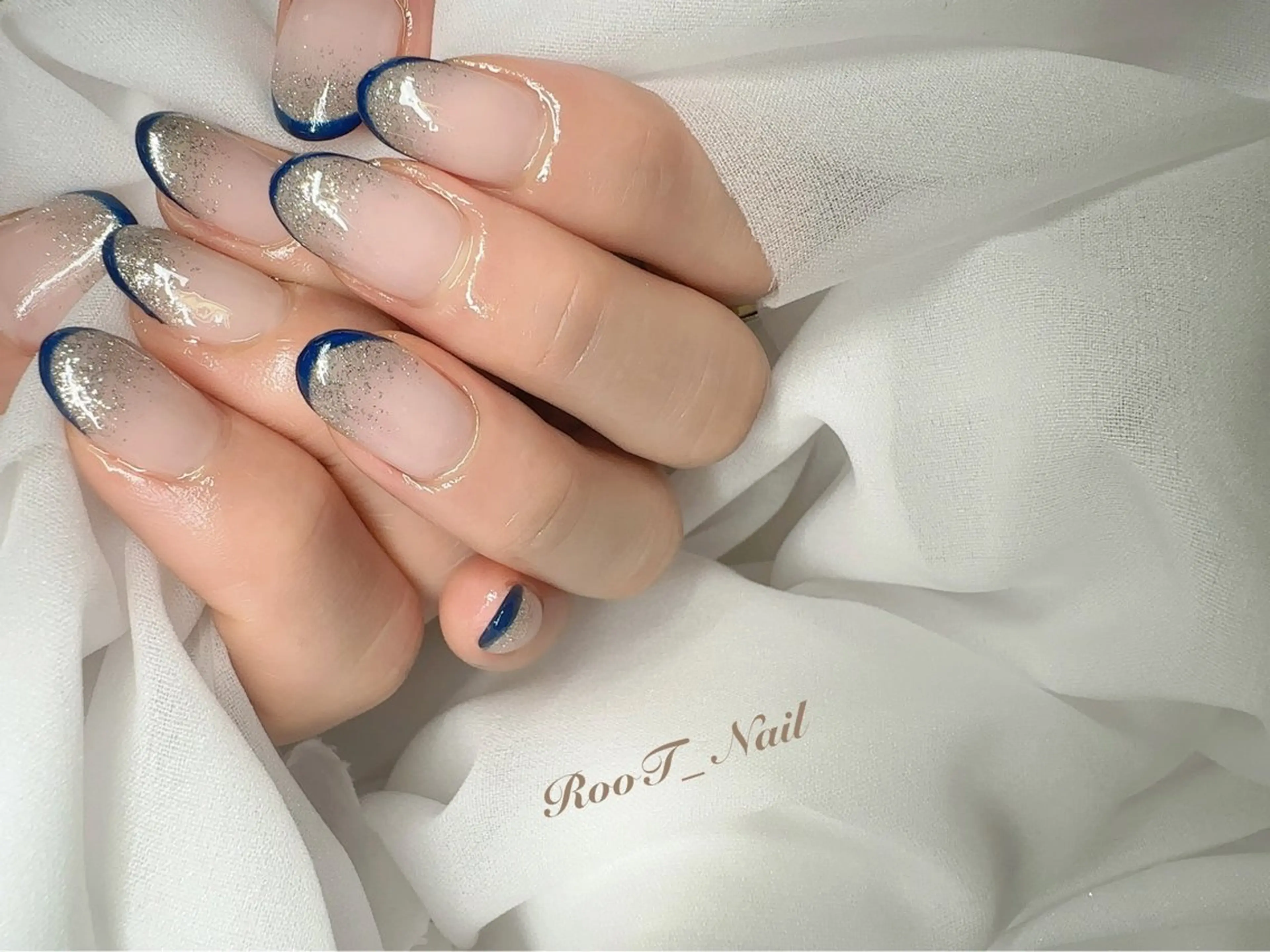 ネイル フレンチネイル グラデーション ラメ(グリッター) ラメグラデーション ハンドネイル RooT Nailのネイルデザイン