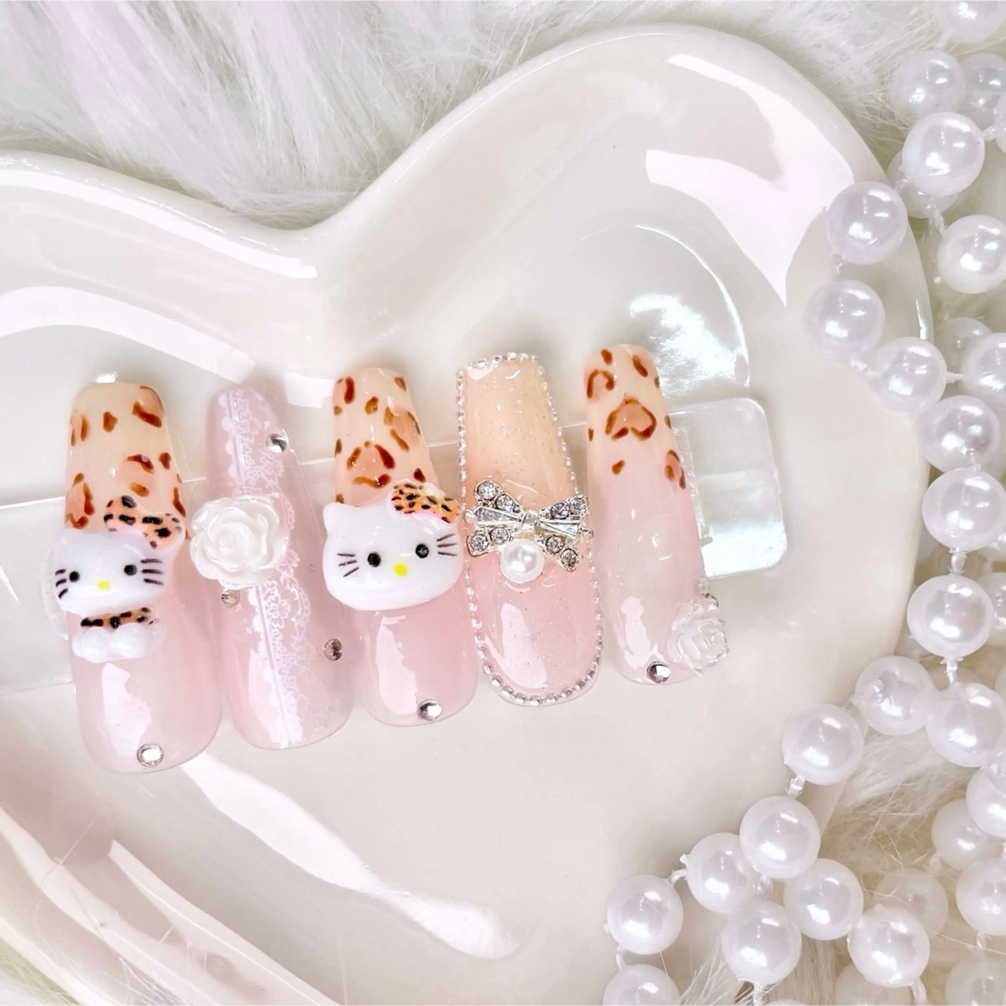 ネイル ハンドネイル TiTi Pomme Rinoのネイルデザイン