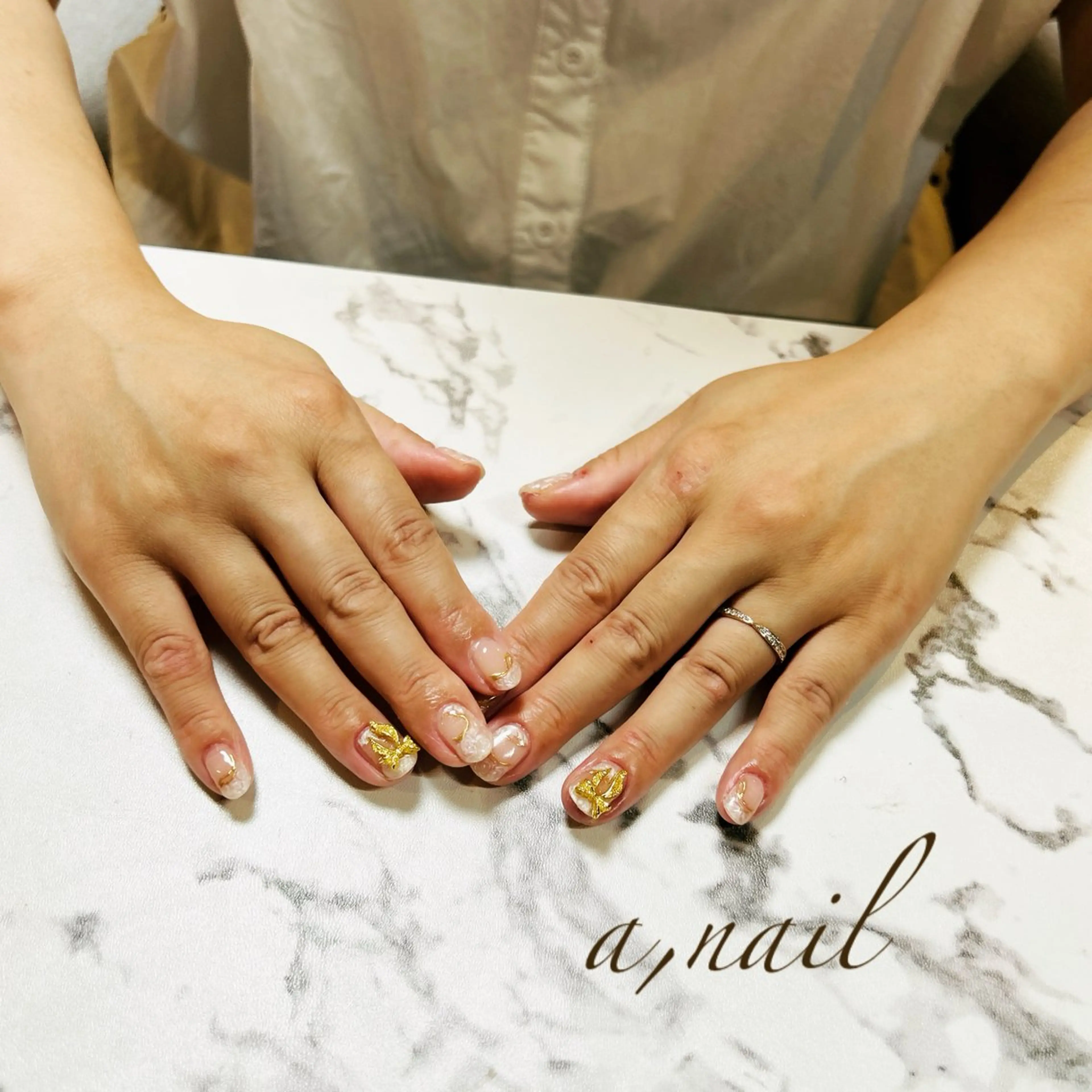 ネイル キラキラネイル ミラーネイル リボン シンプルネイル ブライダルネイル ハンドネイル ネイルサロン エーネイルのネイルデザイン