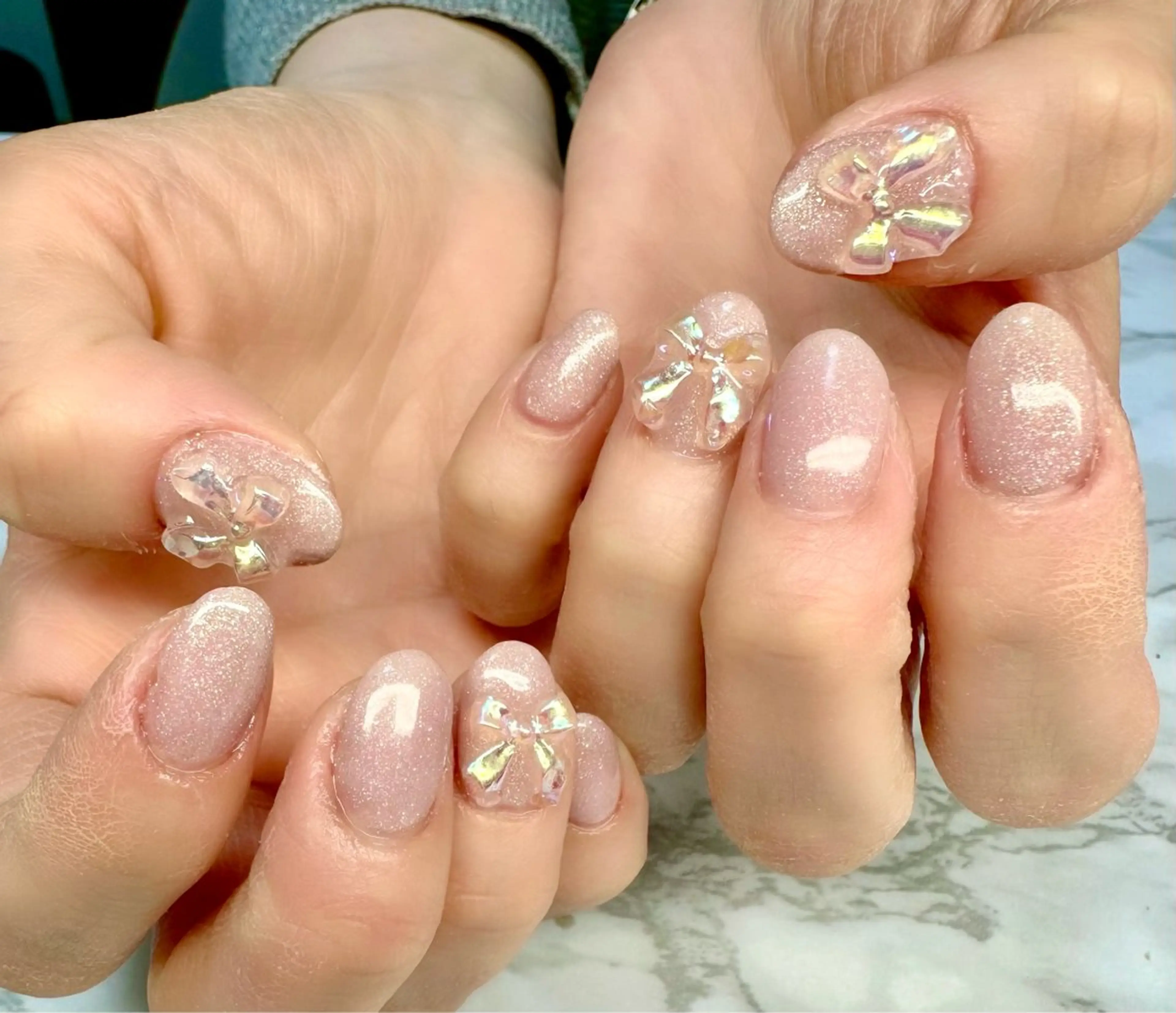 ネイル ラメ(グリッター) ニュアンスネイル リボン 春ネイル M.N_ nailのネイルデザイン