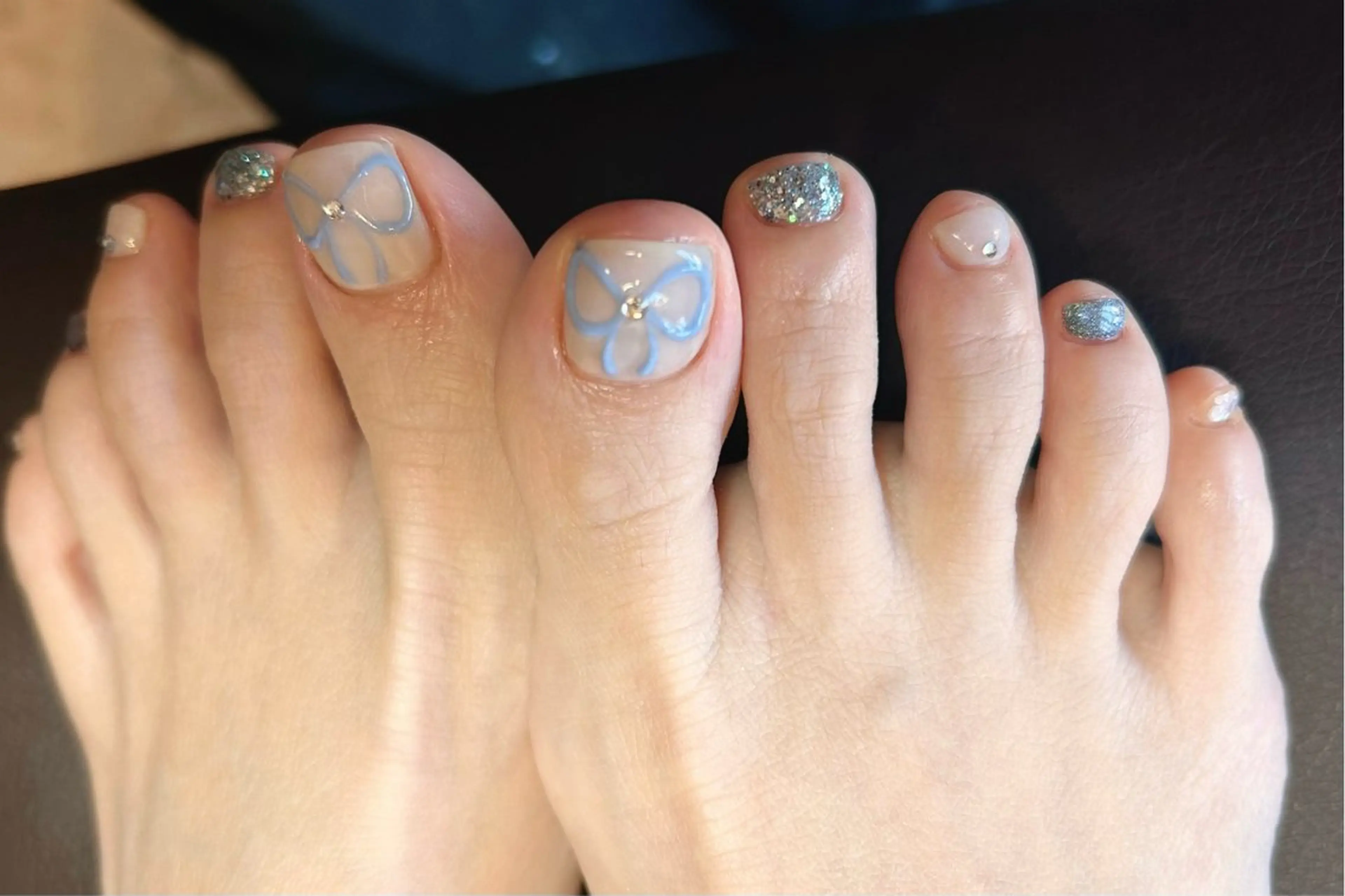 ネイル ブルー フットネイル リボン nail salon  ADORE所属・Adore nailのネイルデザイン