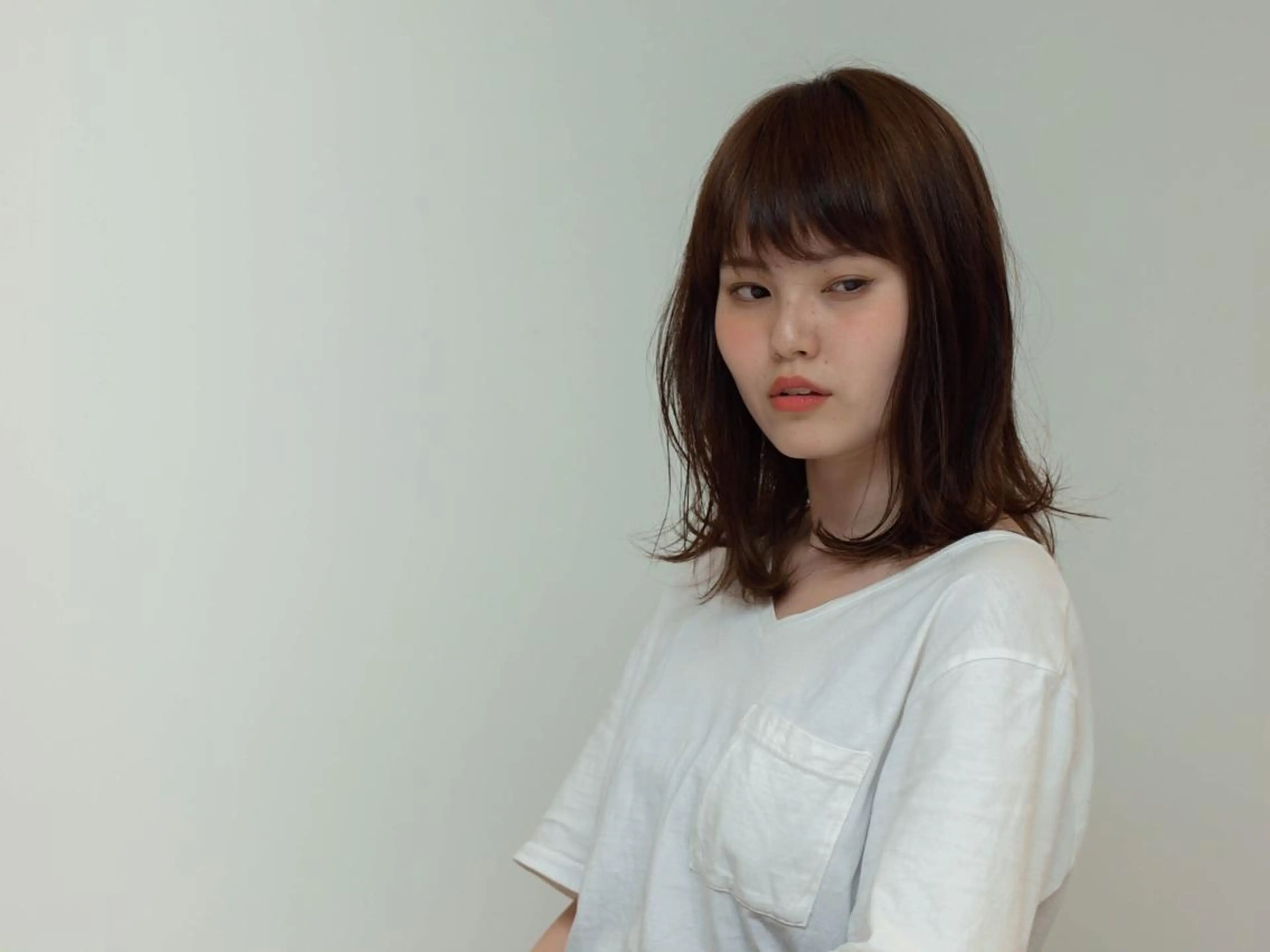 ミディアム ツジガキ ユウスケのヘアスタイル