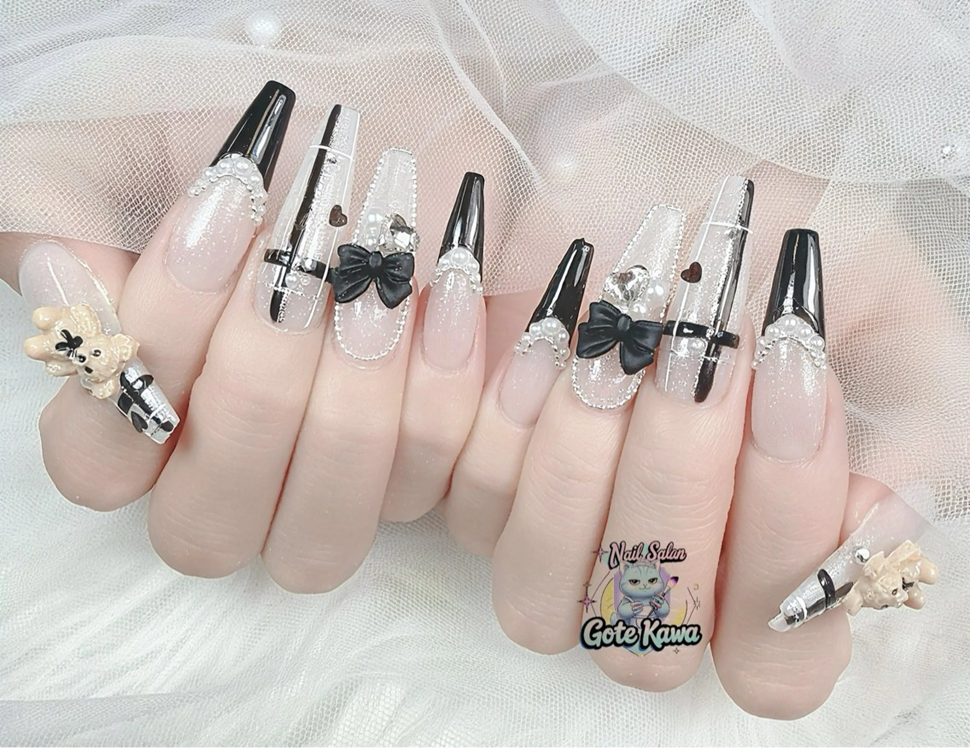 ネイル フレンチネイル キラキラネイル リボン ワンホンネイル ハンドネイル ハンドケア Gote Kawa nail salonのネイルデザイン