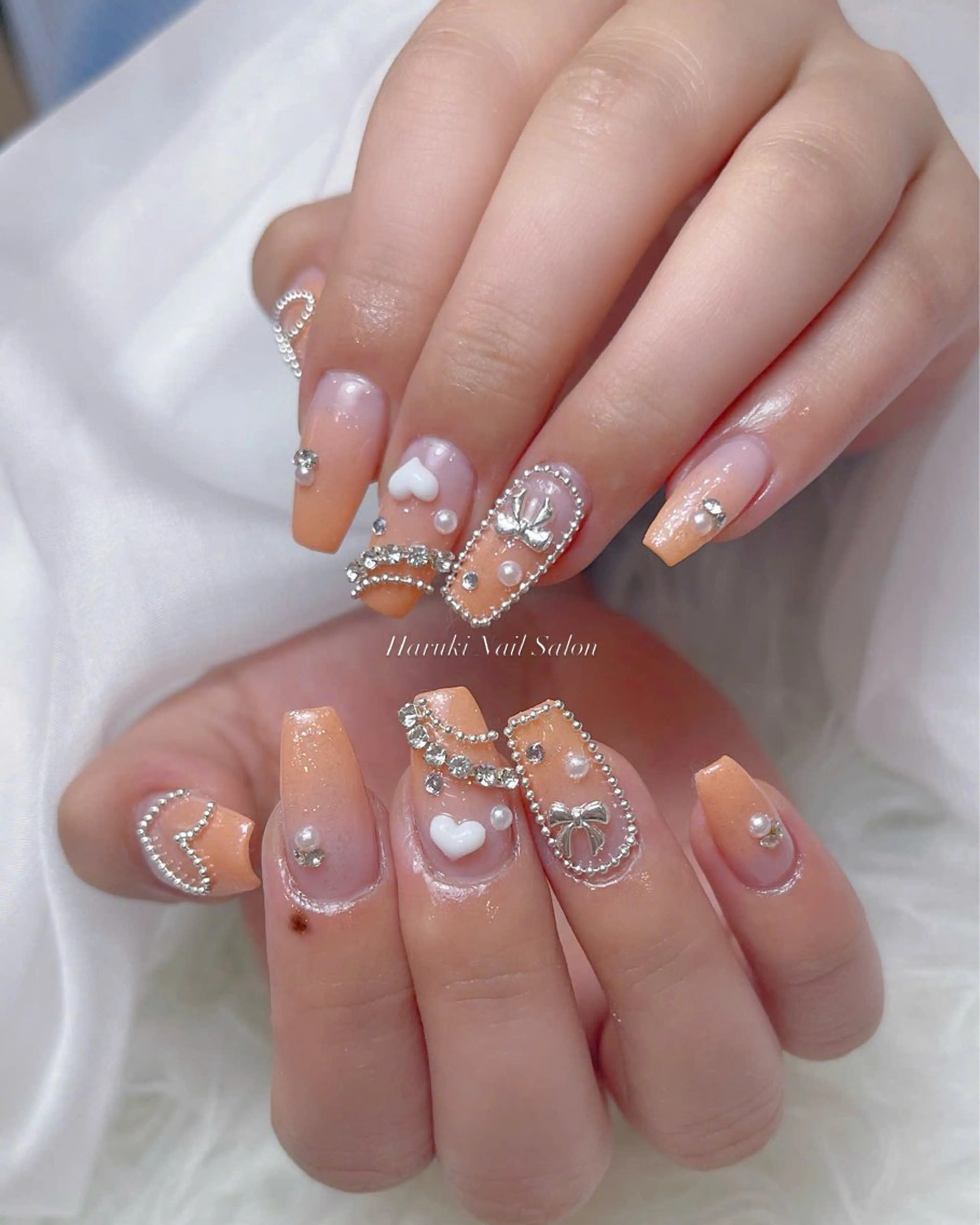ネイル 長さ出し ガーリー ハート キラキラネイル 韓国ネイル ハンドネイル Haruki Nail Salonのネイルデザイン
