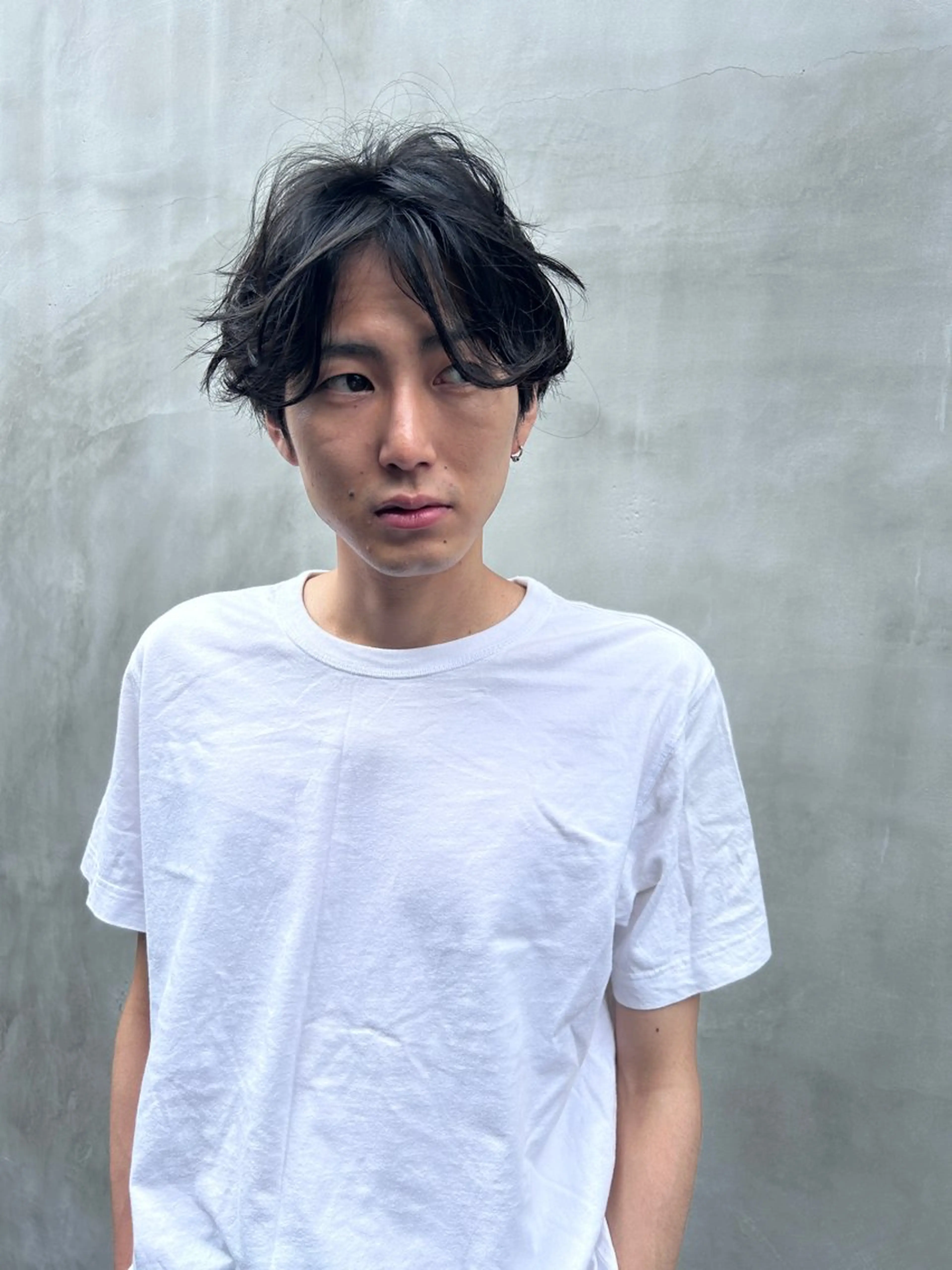 センターパートのニュアンスパーマの写真