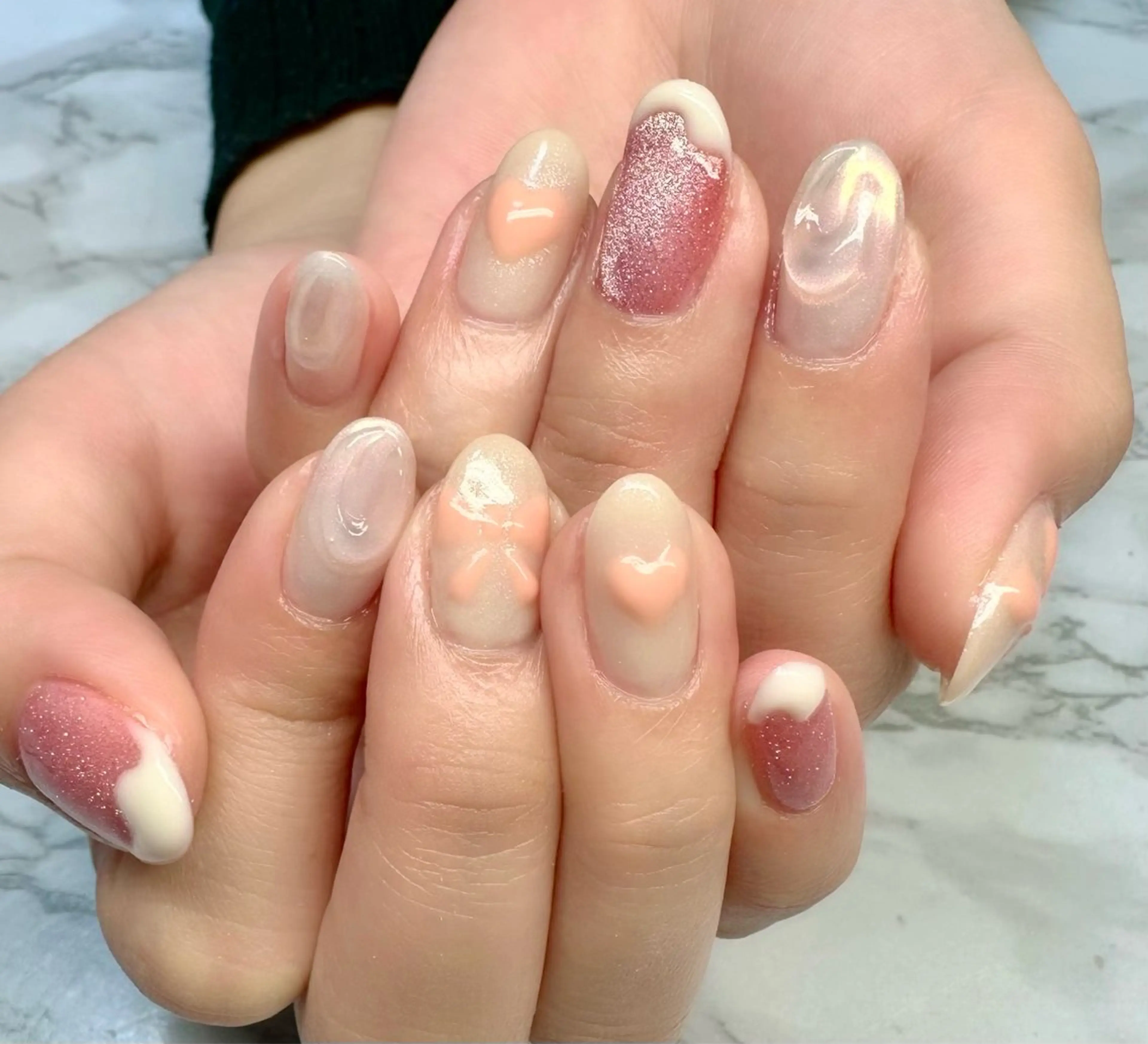 ネイル ラメ(グリッター) ニュアンスネイル リボン 春ネイル M.N_ nailのネイルデザイン