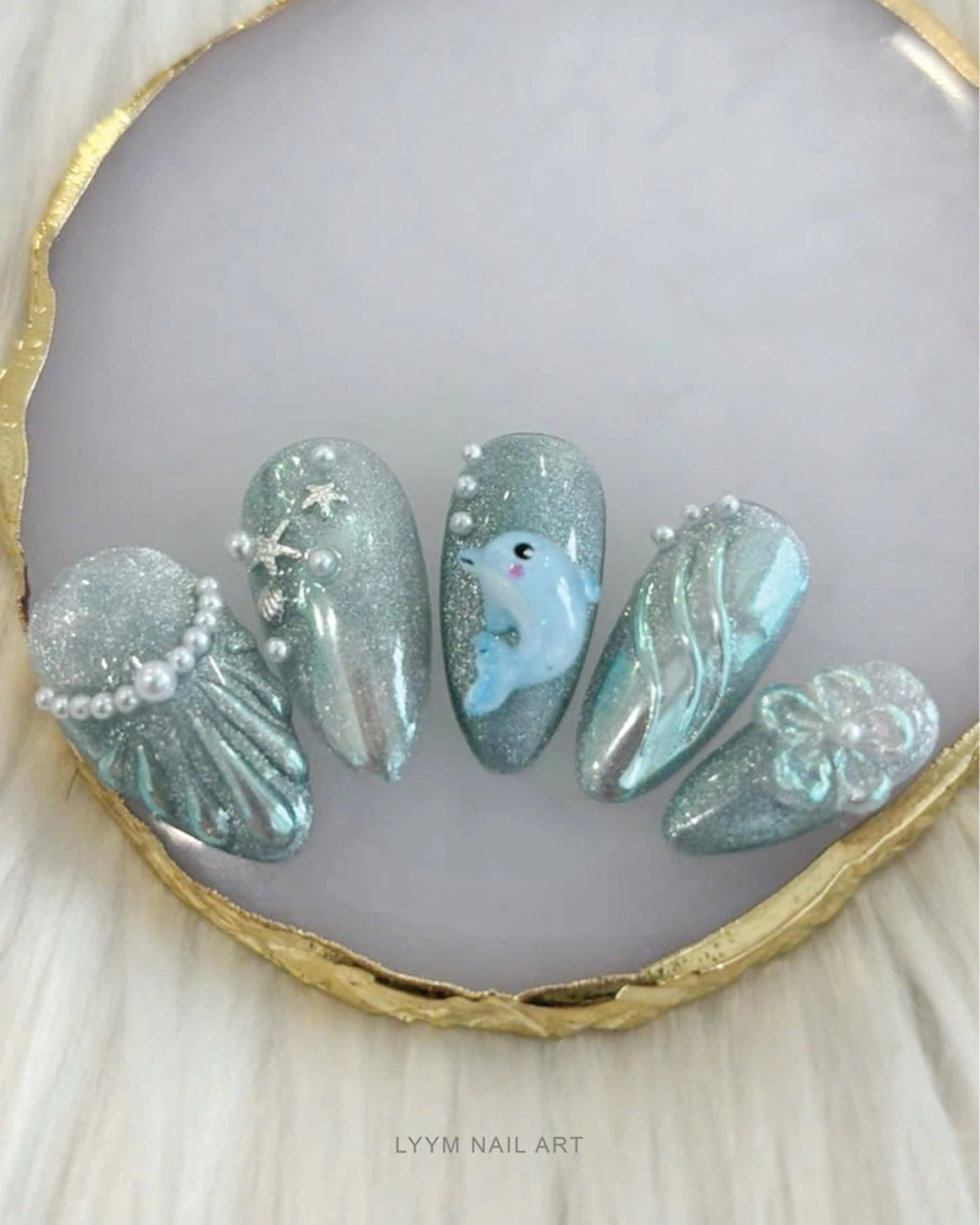 ネイル ブルー キラキラネイル 韓国ネイル ラメ(グリッター) 夏ネイル ハンドネイル LYYM Salonのネイルデザイン
