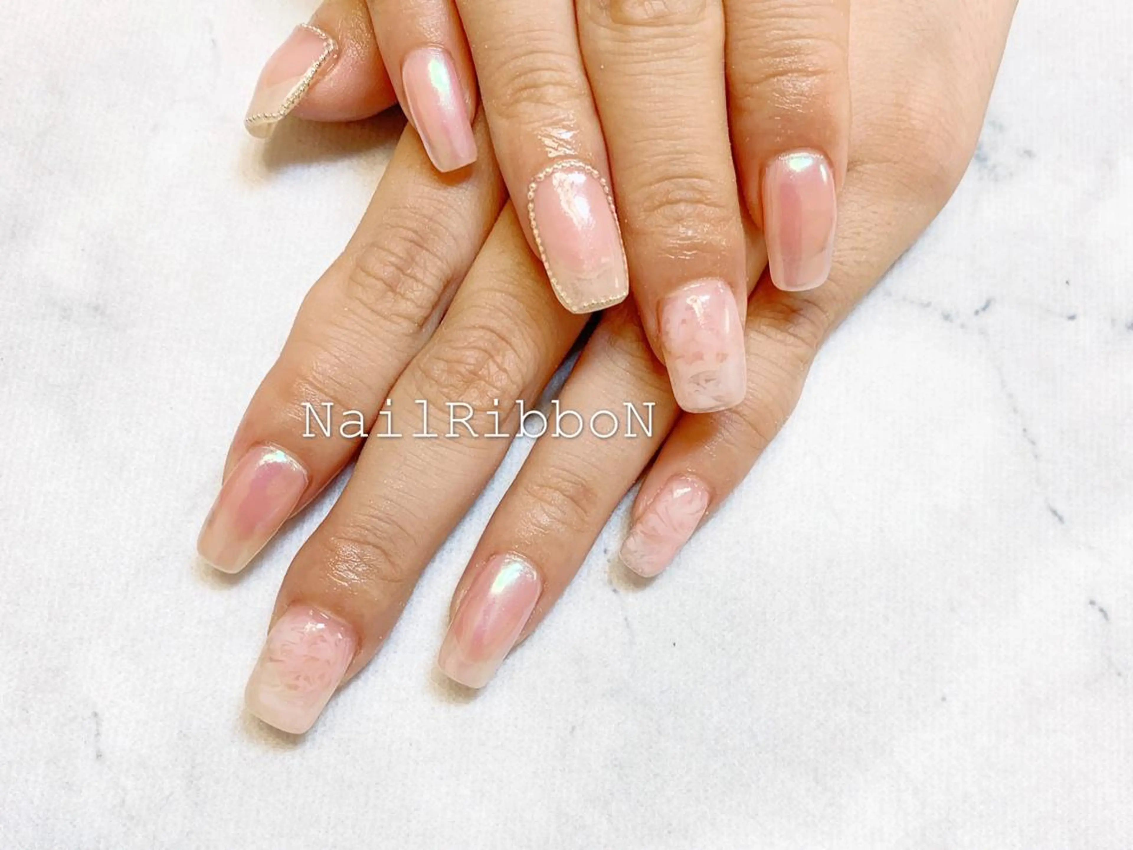 ネイル ネイルリボン 受付スタッフのネイルデザイン