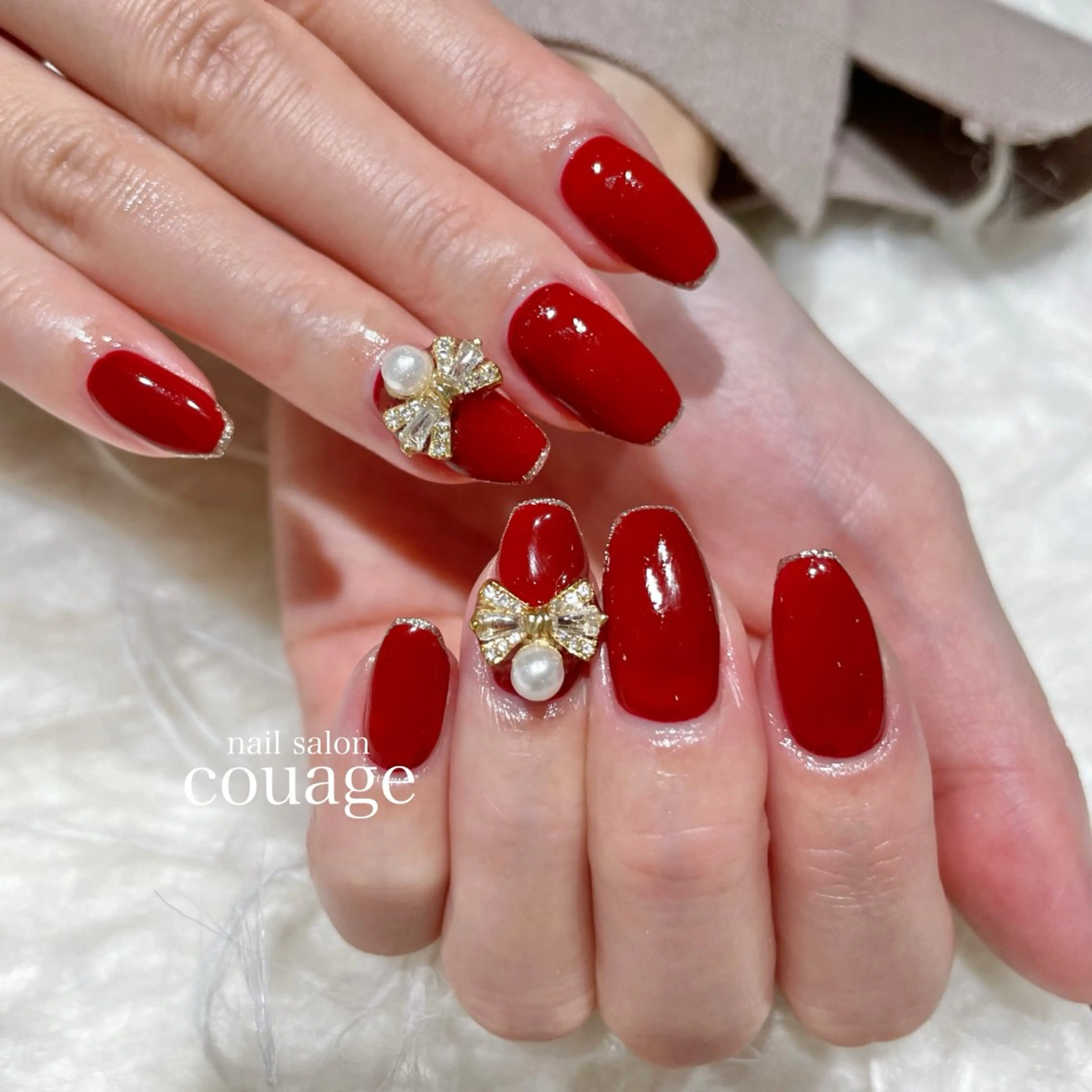 ネイル ボルドー ラメ(グリッター) ワンカラーネイル リボン ハンドネイル ネイルサロンcourage所属・ネイルサロン courageのネイルデザイン