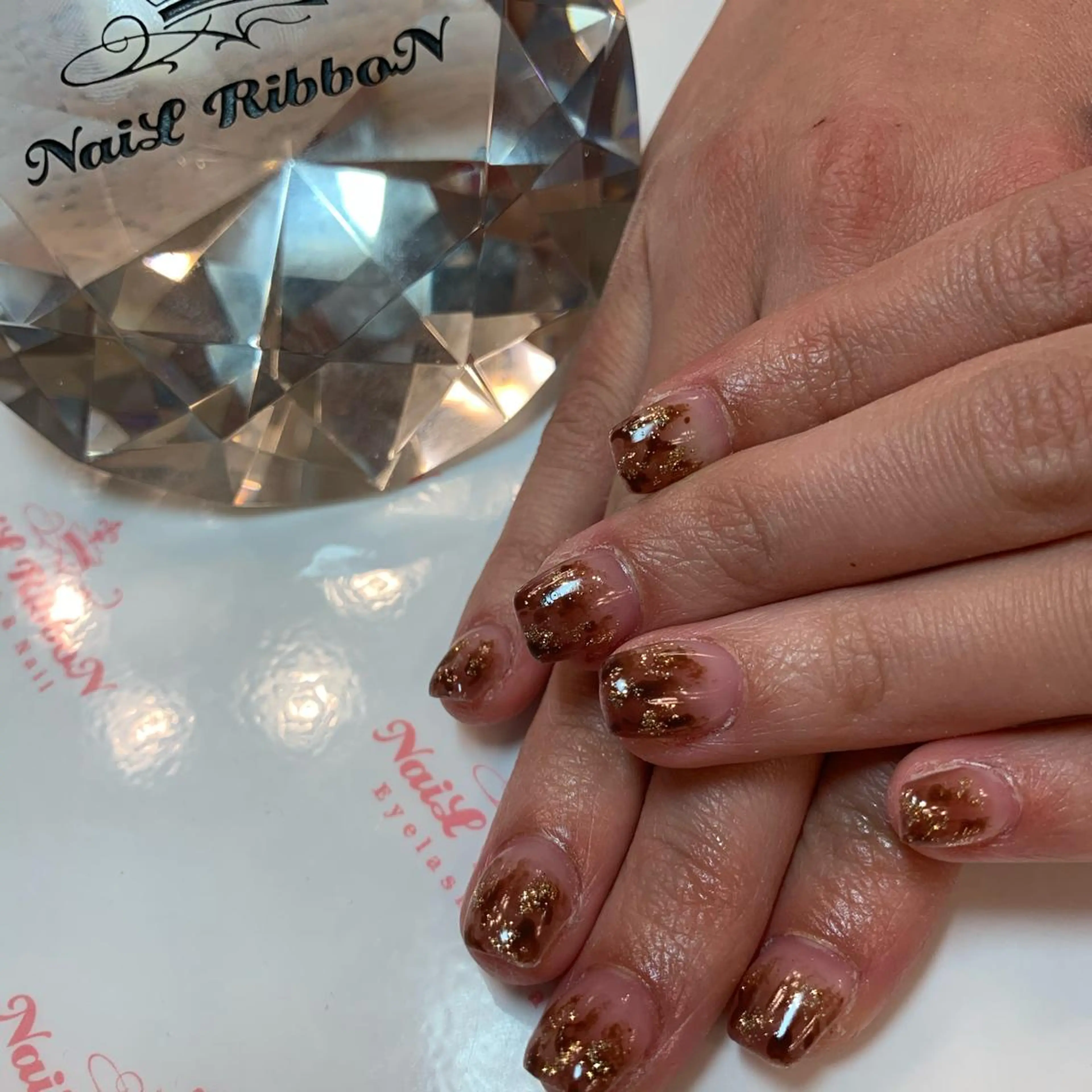 ネイル ネイルリボン 受付スタッフのネイルデザイン