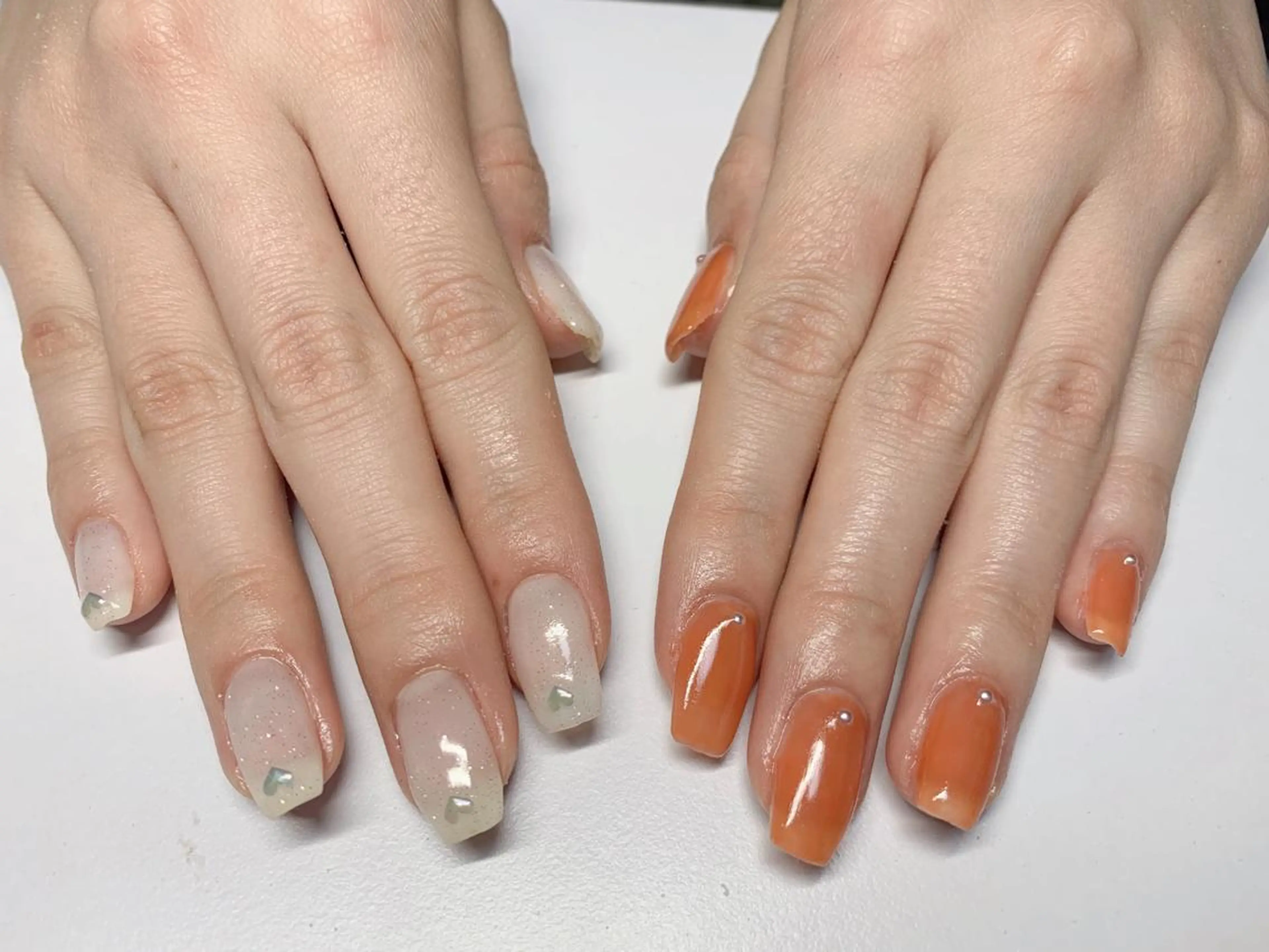 ネイル ラメ(グリッター) オレンジ ホワイト 池崎 美穂のネイルデザイン