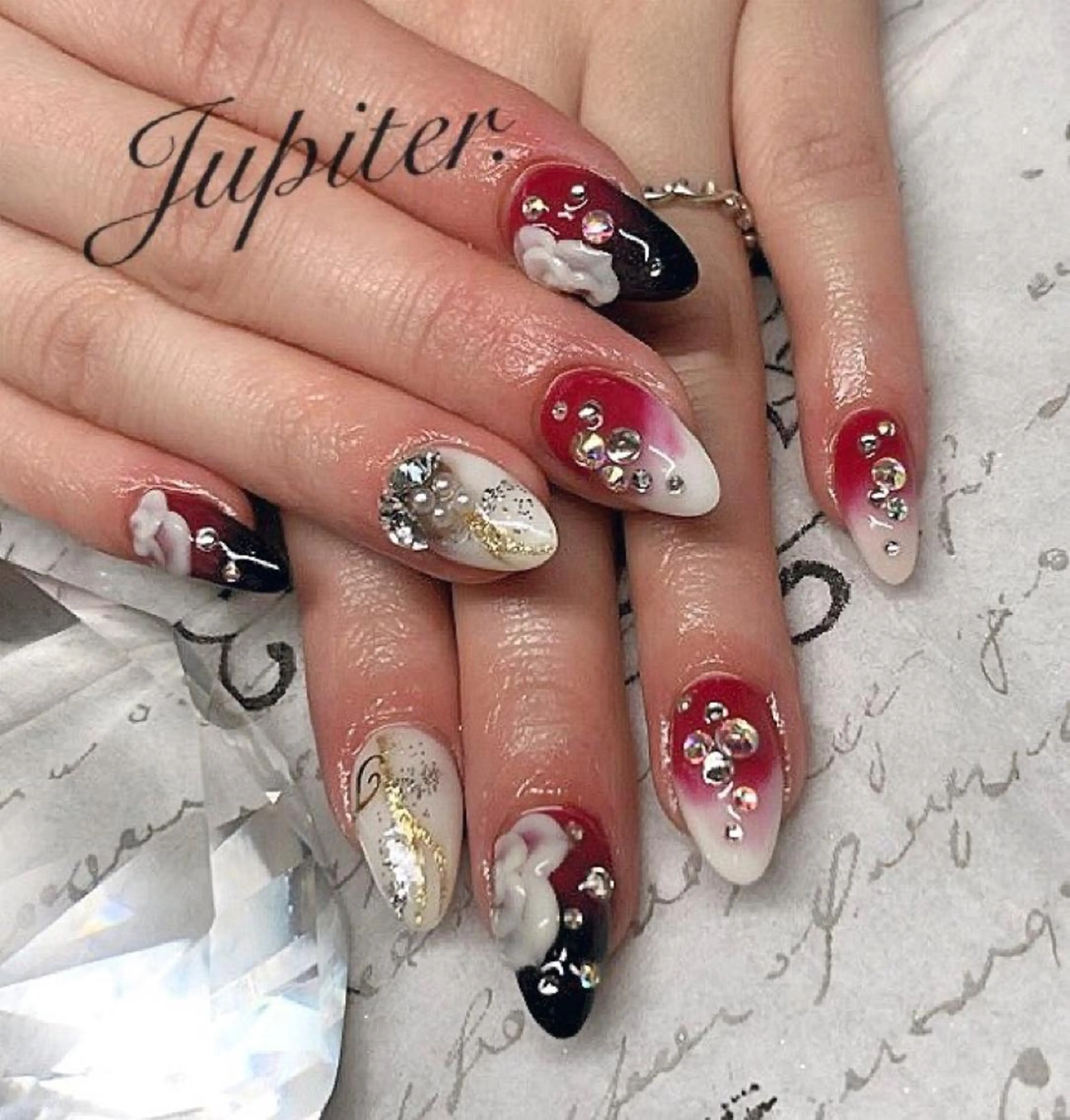 ネイル 成人式 ストーンネイル Jupiter .のネイルデザイン