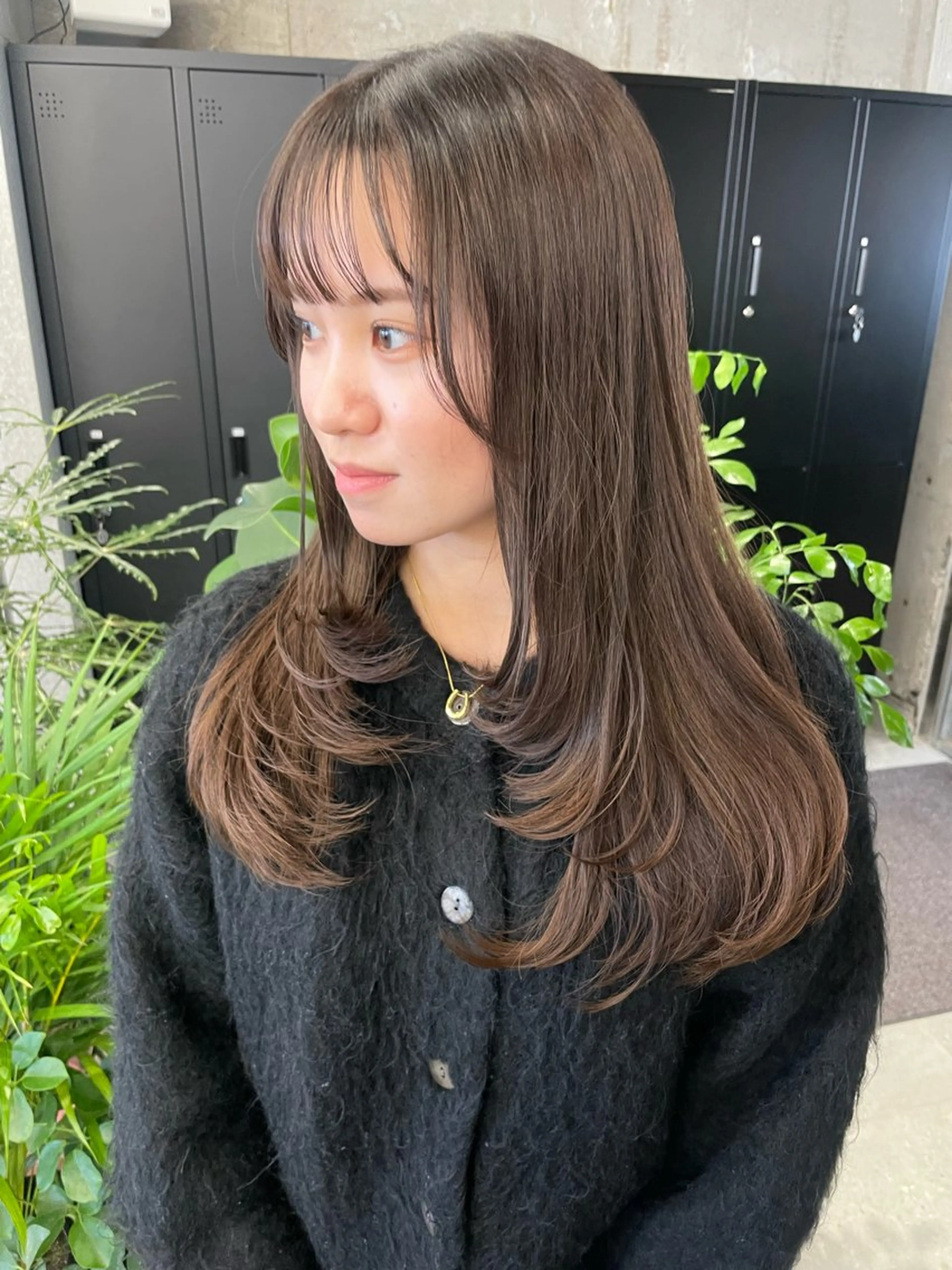 ロング MIFA レイヤー／パーマのヘアスタイル