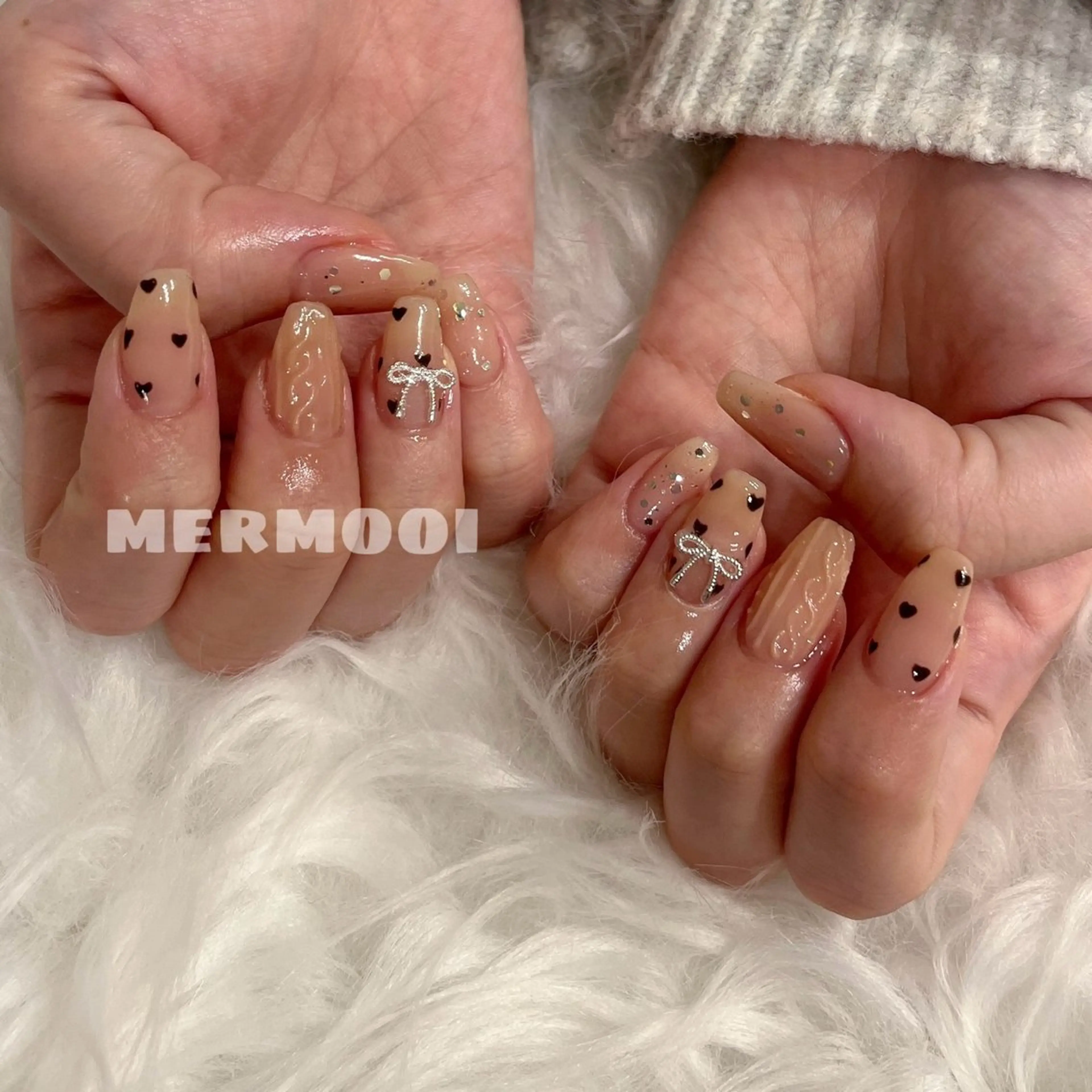 ネイル 韓国ネイル リボン melumooi nailのネイルデザイン