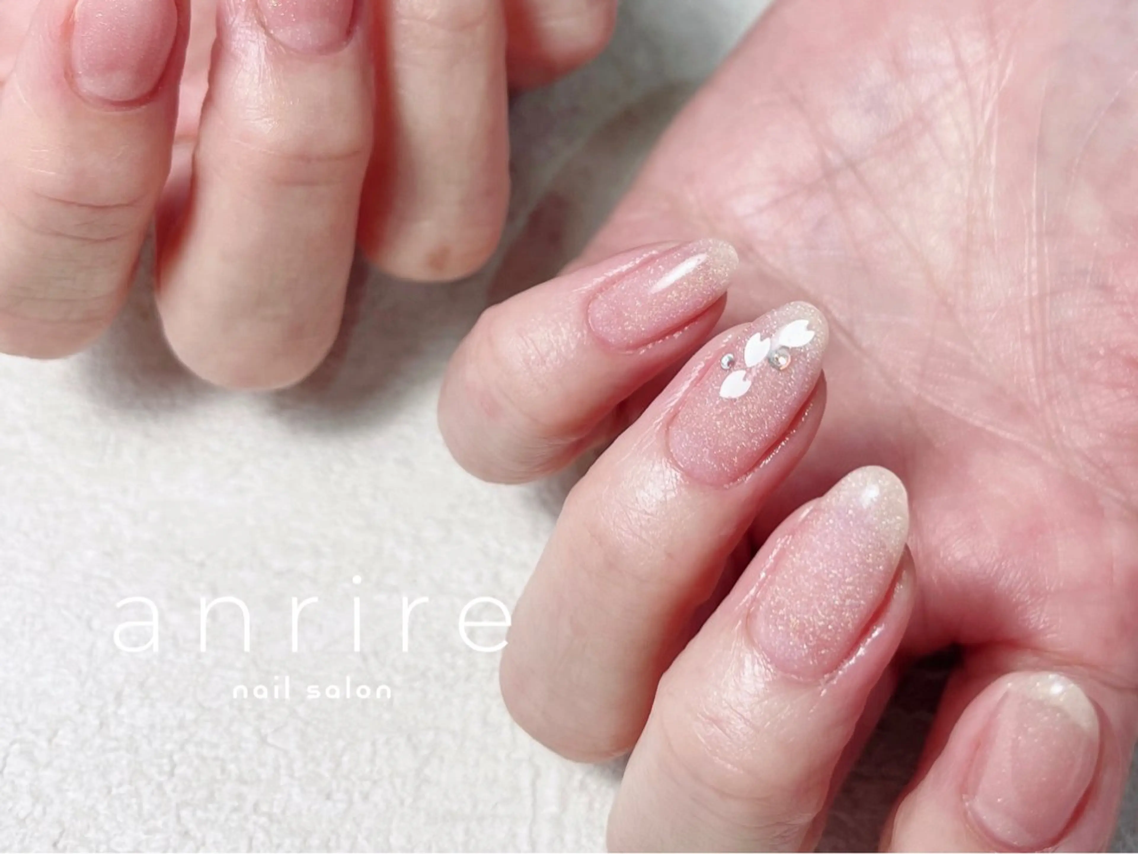 ネイル アートネイル 桜ネイル フラワーネイル ジェルネイル キラキラネイル ハンドネイル nailsalon anrireのネイルデザイン