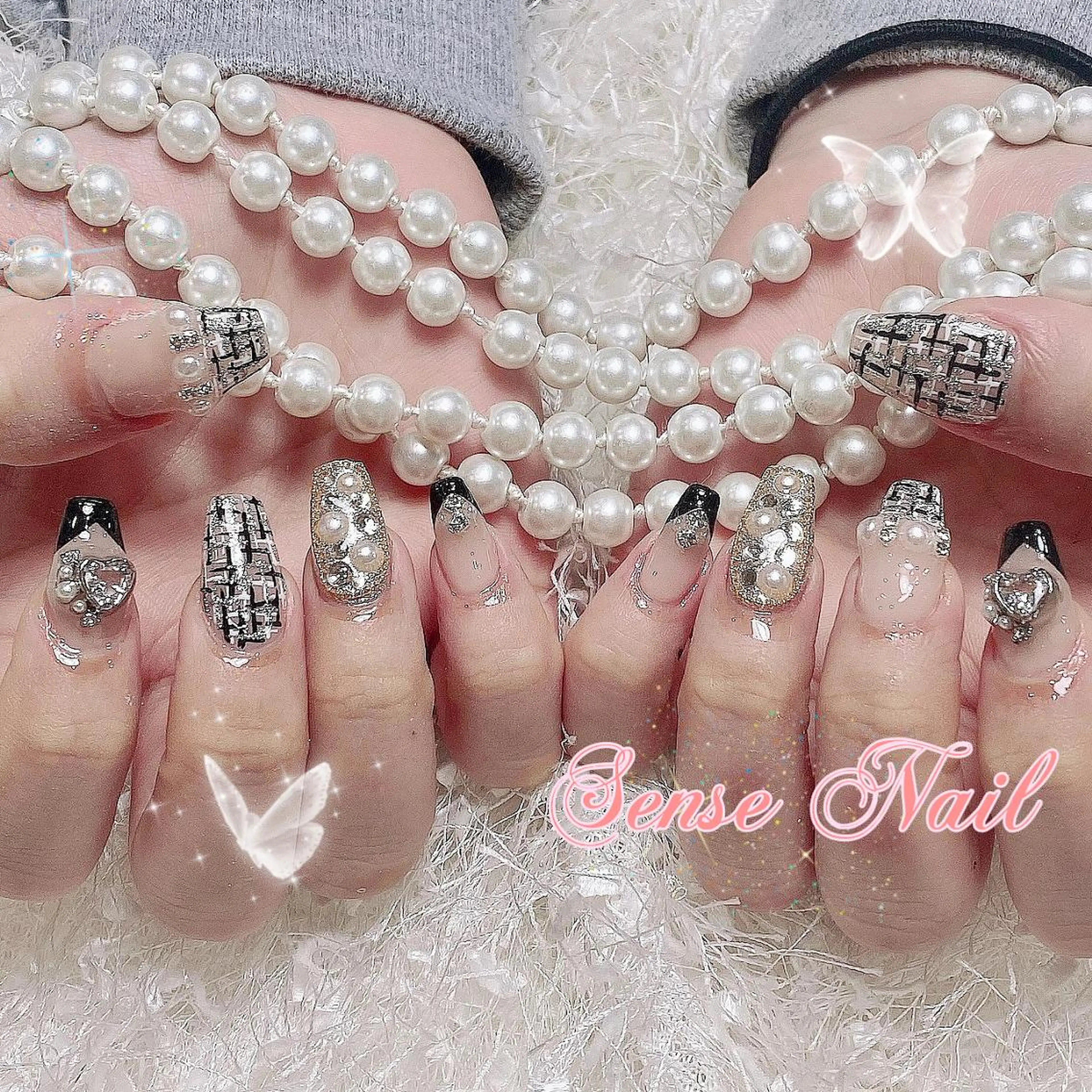 ネイル 🦋 Queenieのネイルデザイン