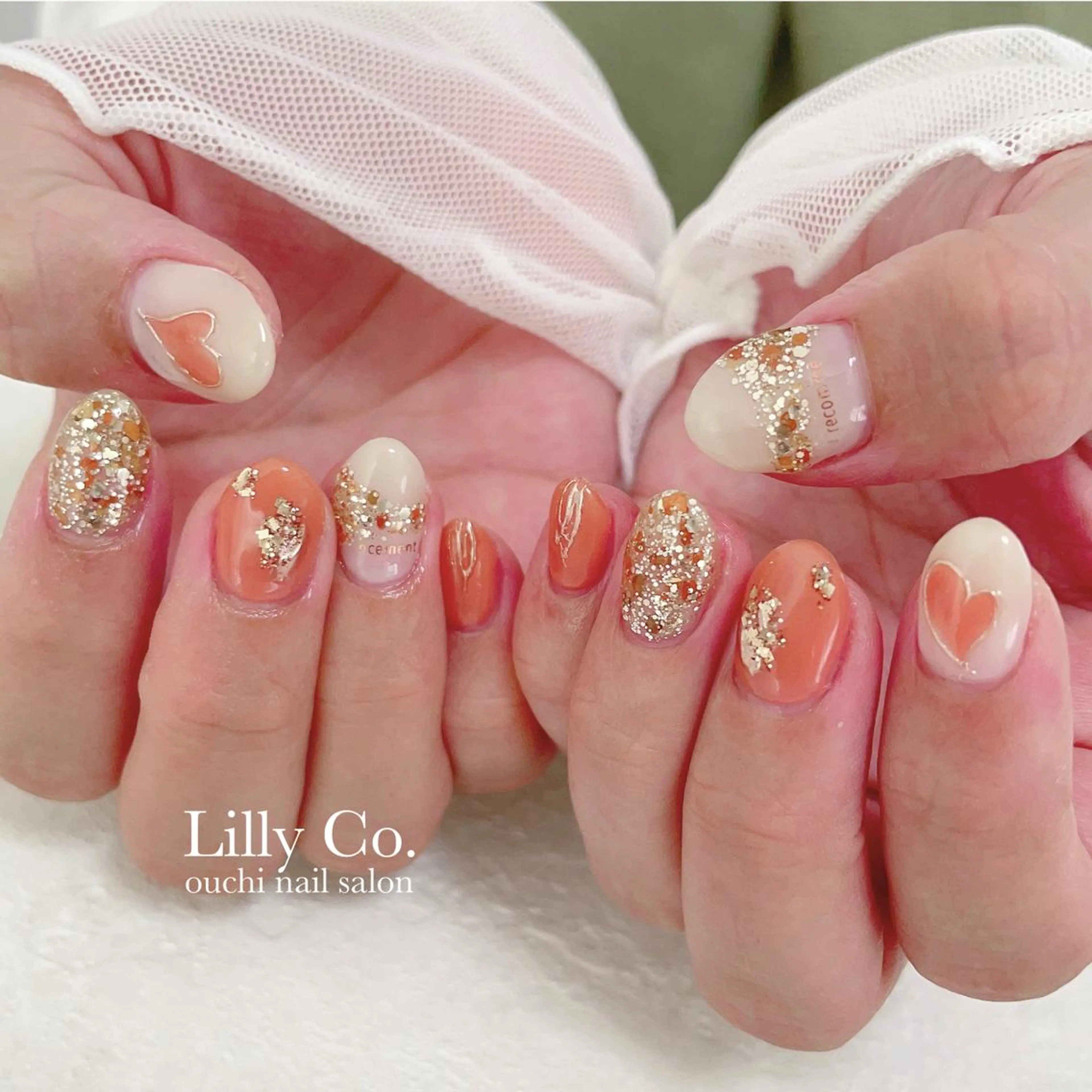 ネイル アートネイル オレンジ ハンドネイル ハンドケア Lilly Co.のネイルデザイン