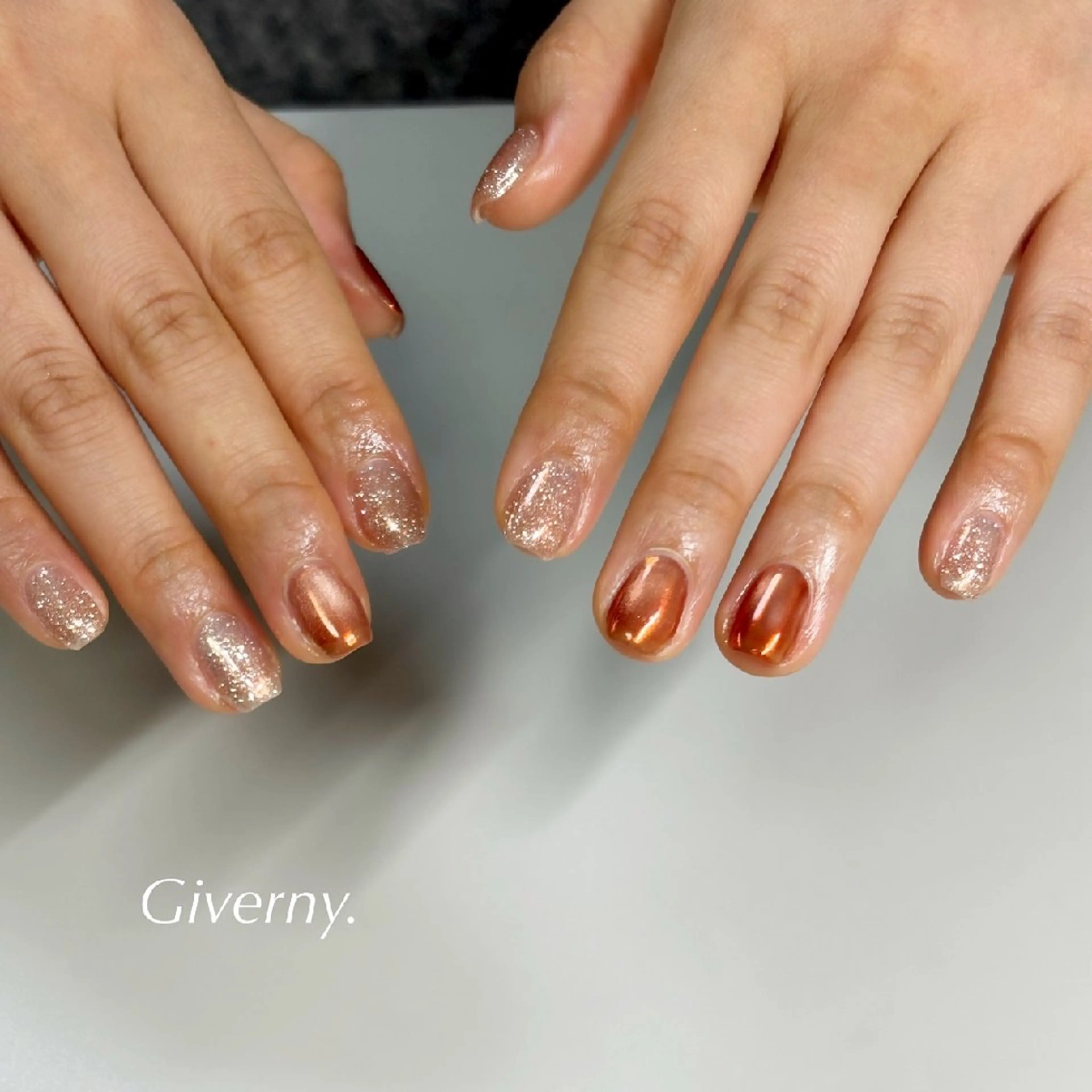 ネイル オーロラネイル フラッシュネイル マグネットネイル オレンジ ハンドネイル Giverny .のネイルデザイン