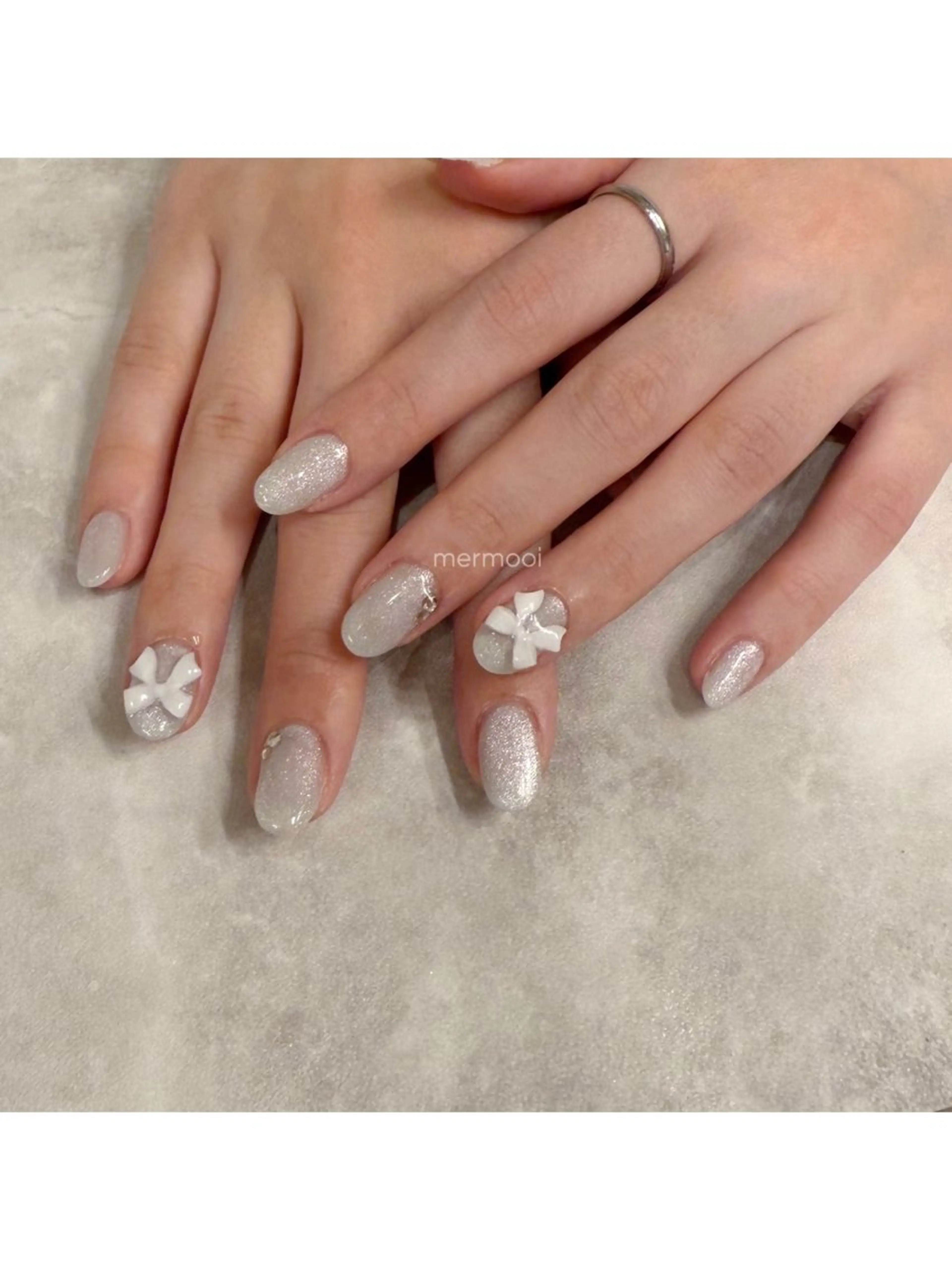 ネイル 韓国ネイル マグネットネイル リボン melumooi nailのネイルデザイン
