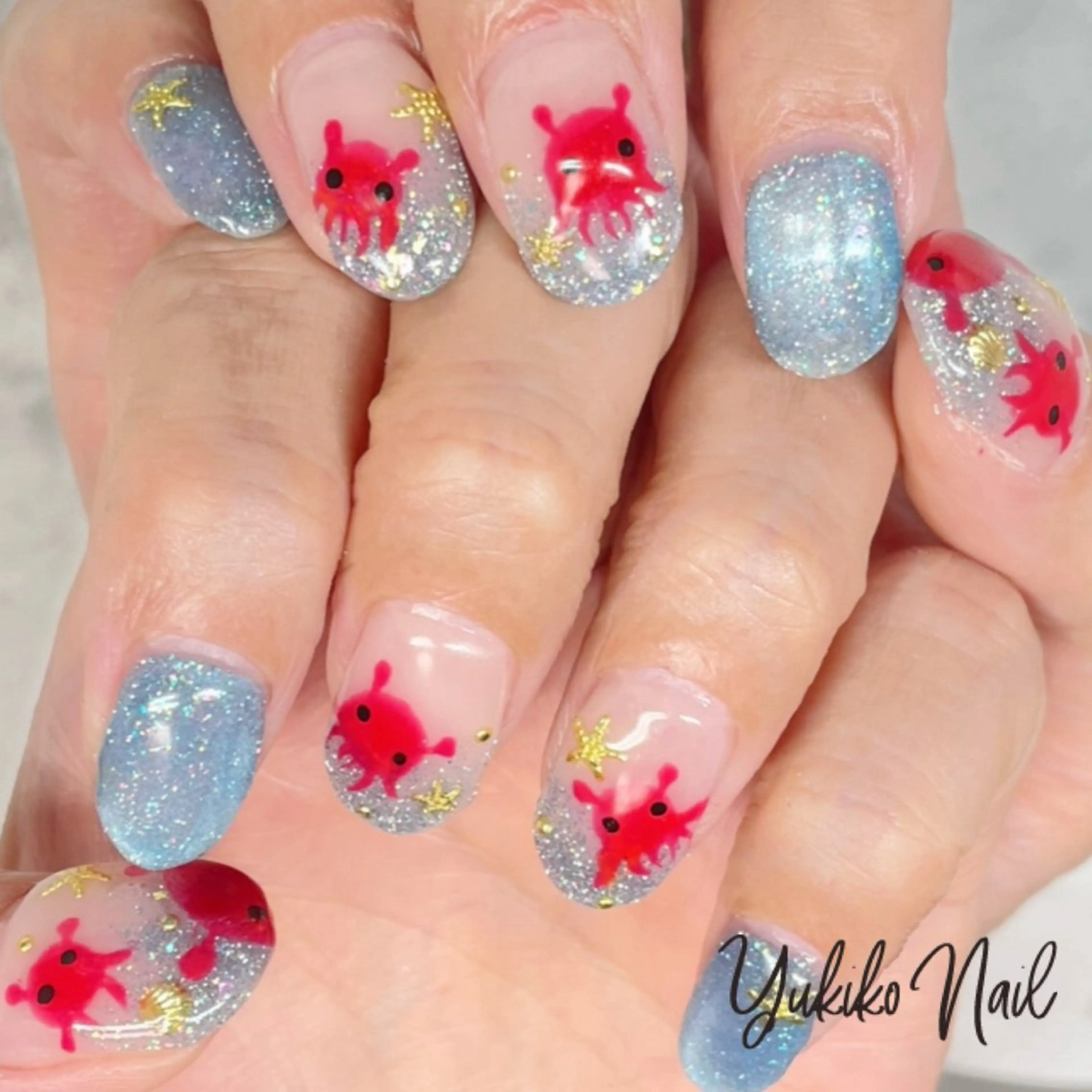 ネイル フラッシュネイル グラデーション ラメ(グリッター) ラメグラデーション 水色 ハンドネイル ユキコ ネイルのネイルデザイン