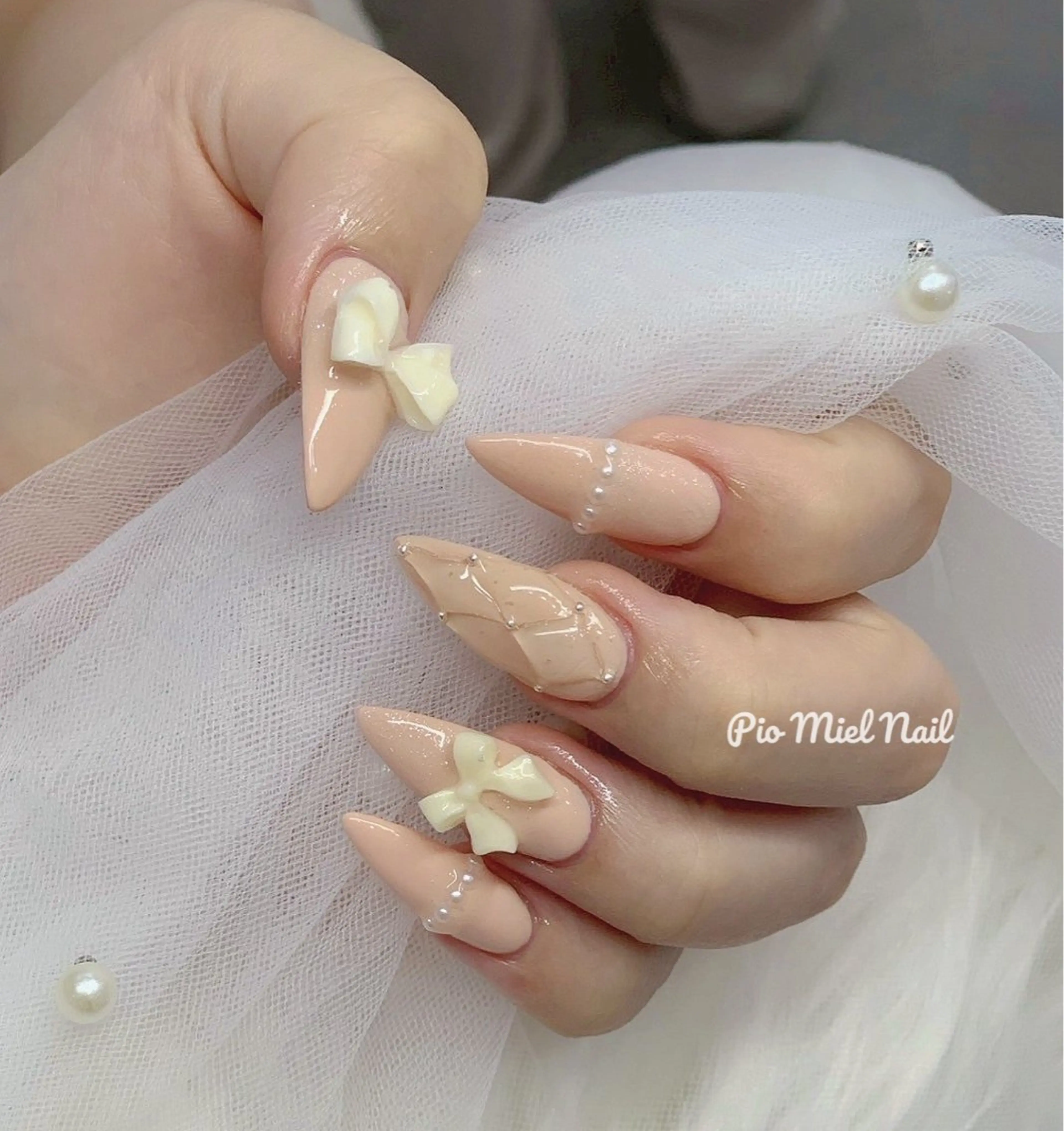 ネイル ガーリー ロングネイル リボン ハンドネイル HANA 長さだしのネイルデザイン